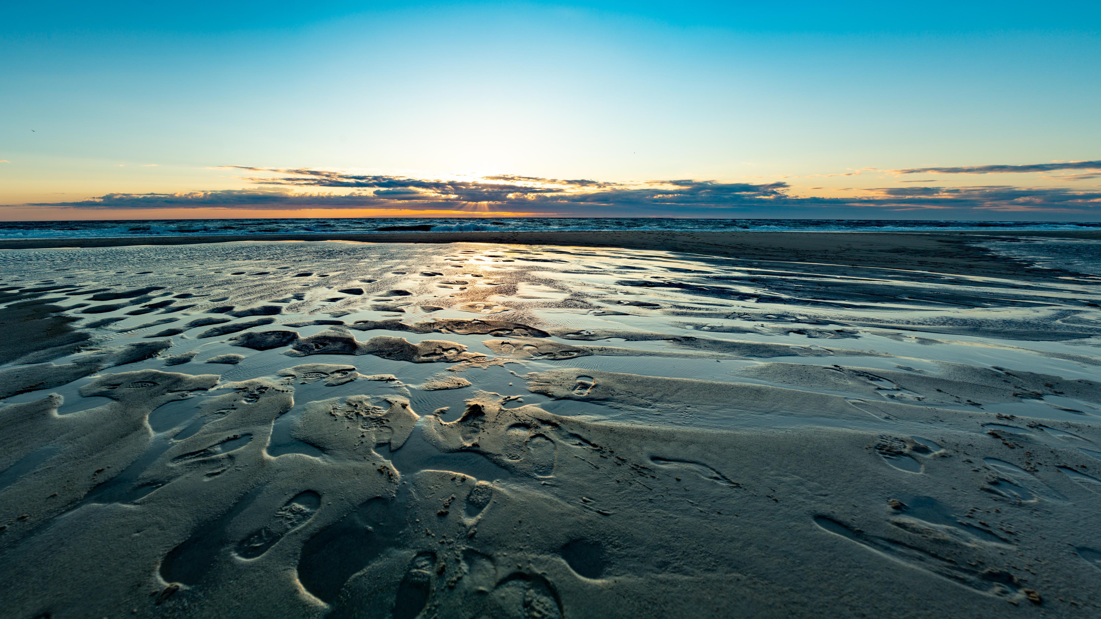 Küchenrückwand-Wunderschöne blaue und orange Strandlandschaft mit Sonnenuntergang