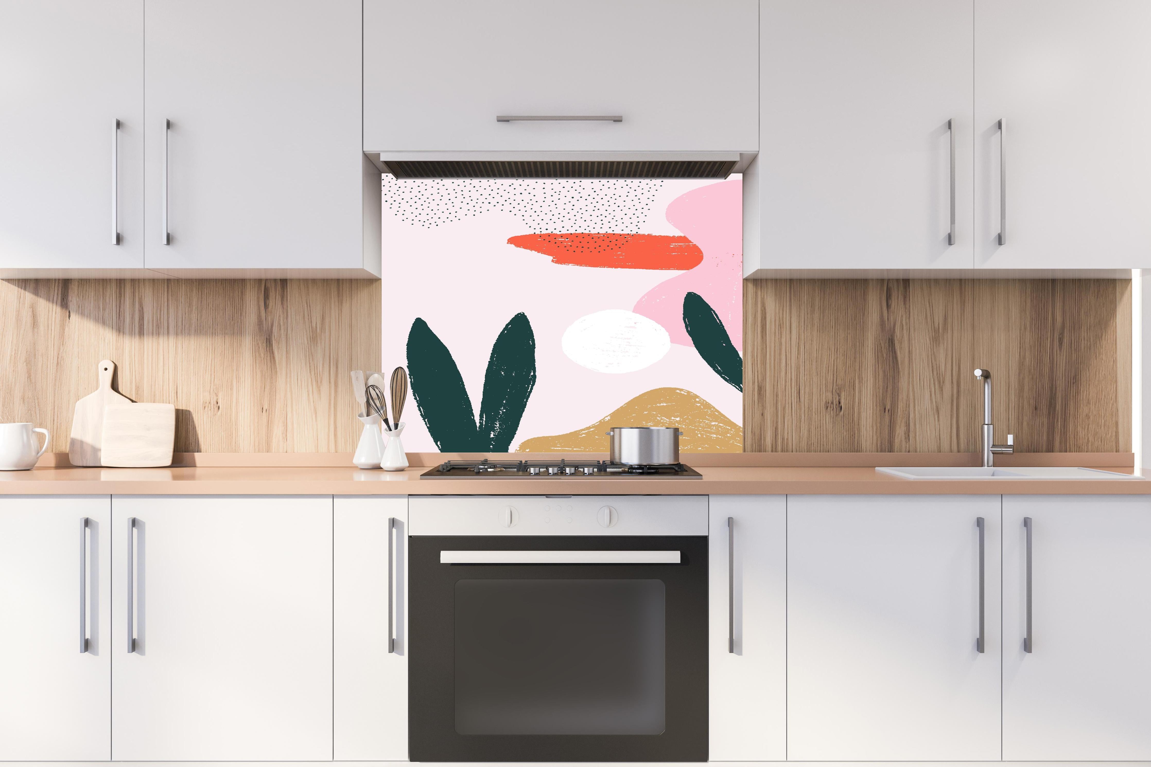 Spritzschutz - Abstrakte Formen und Farbspiele in Pink hinter einem Cerankochfeld zwischen Holz-Kochutensilien