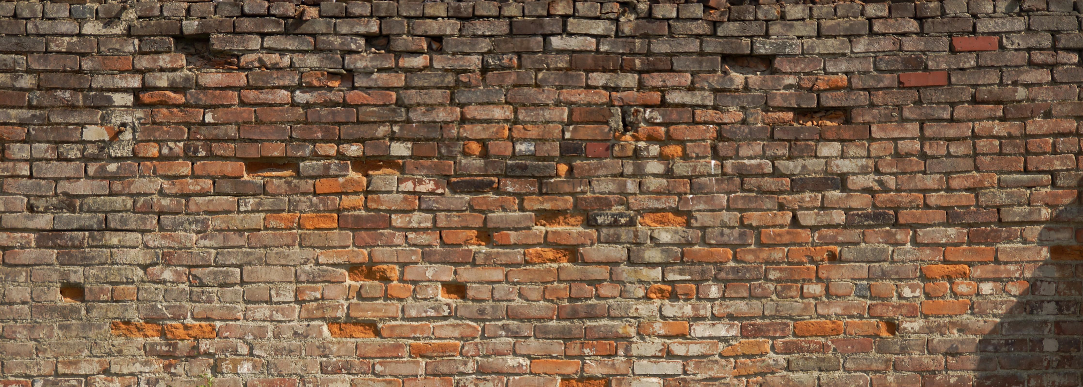 Spritzschutz-Alte kaputte Ziegelwand