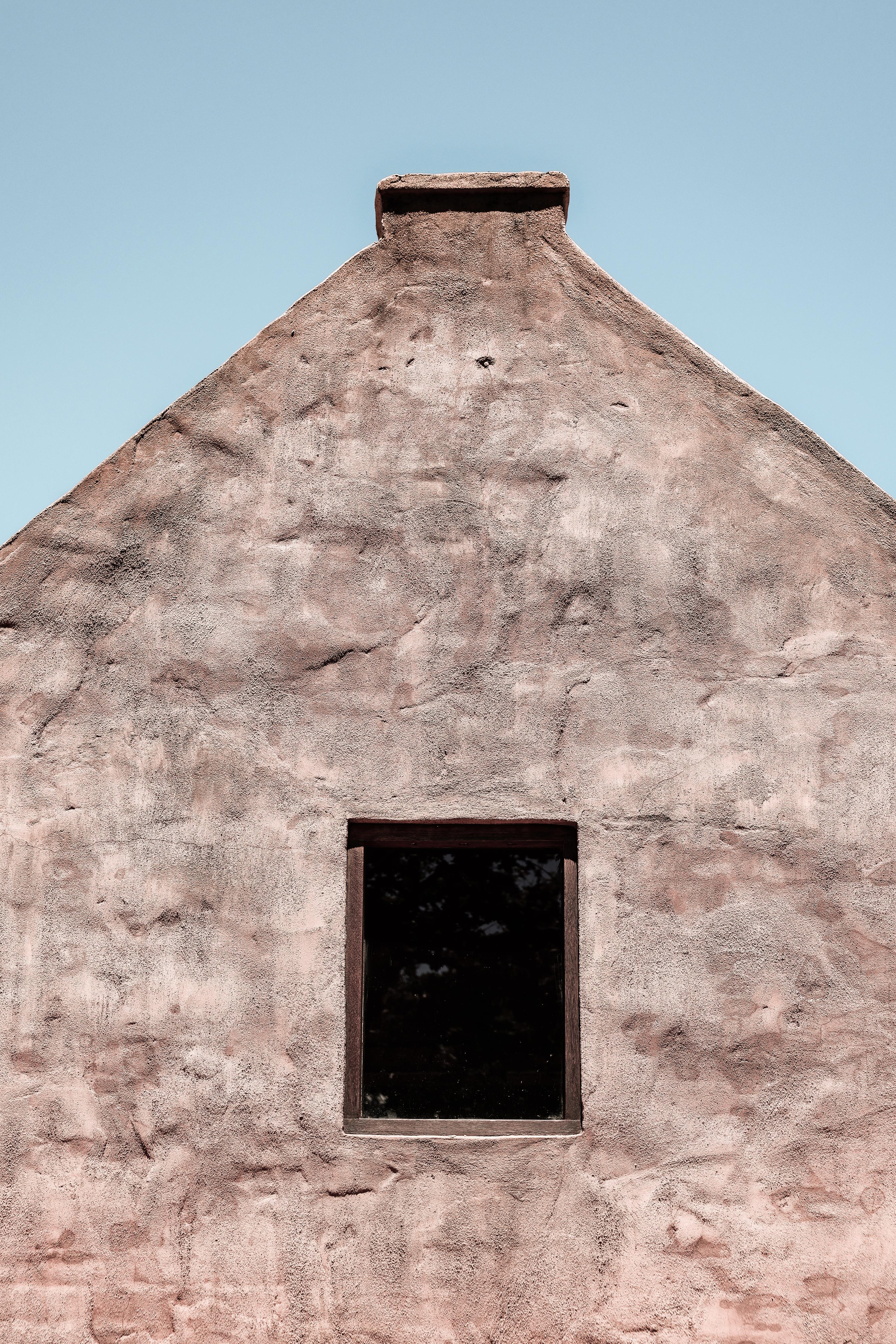 Spritzschutz-Altes Gebäude Fassade klarer Blauer Himmel
