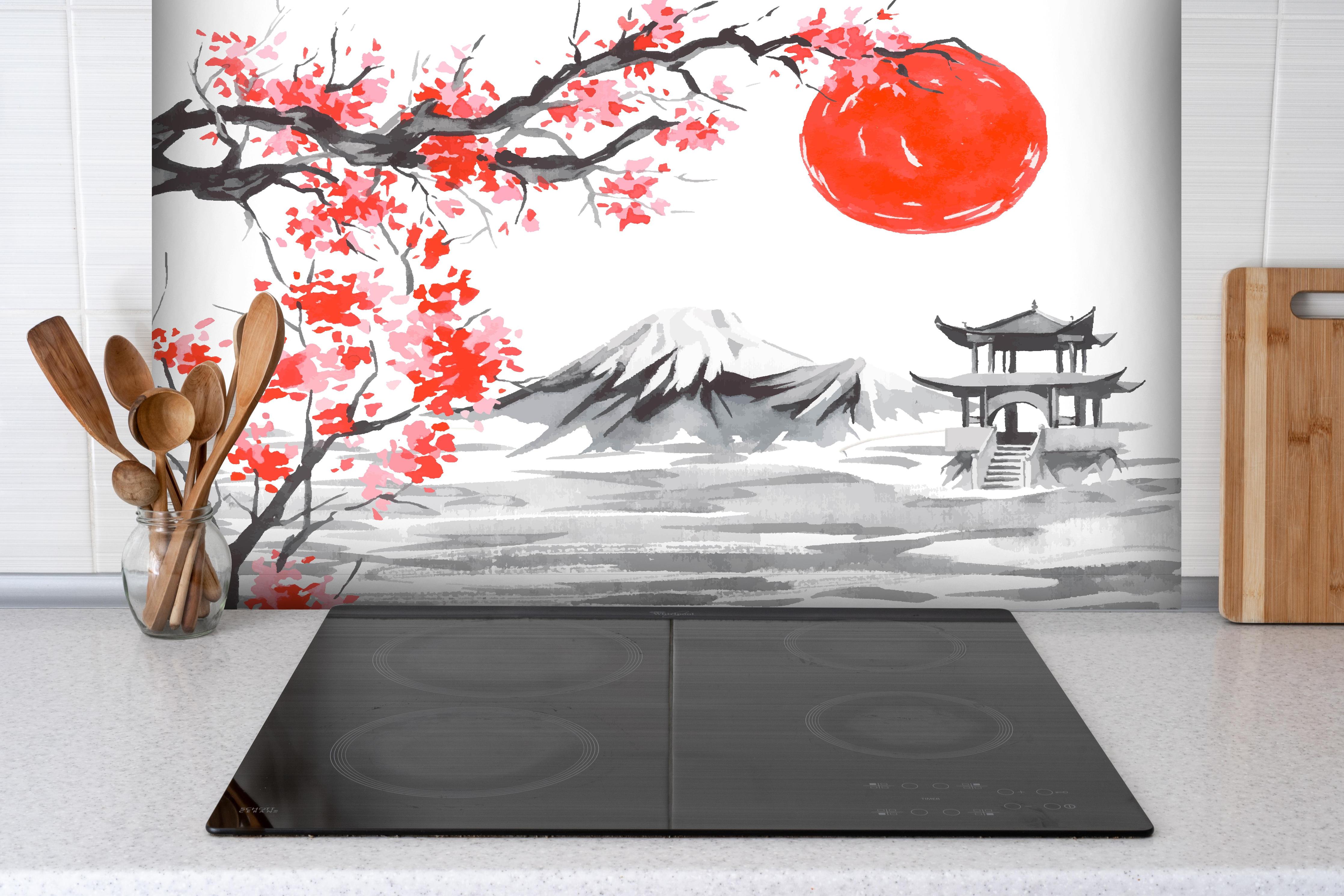 Spritzschutz - Asiatische Aquarellkunst mit Berg & Sonne hinter einem Cerankochfeld zwischen Holz-Kochutensilien