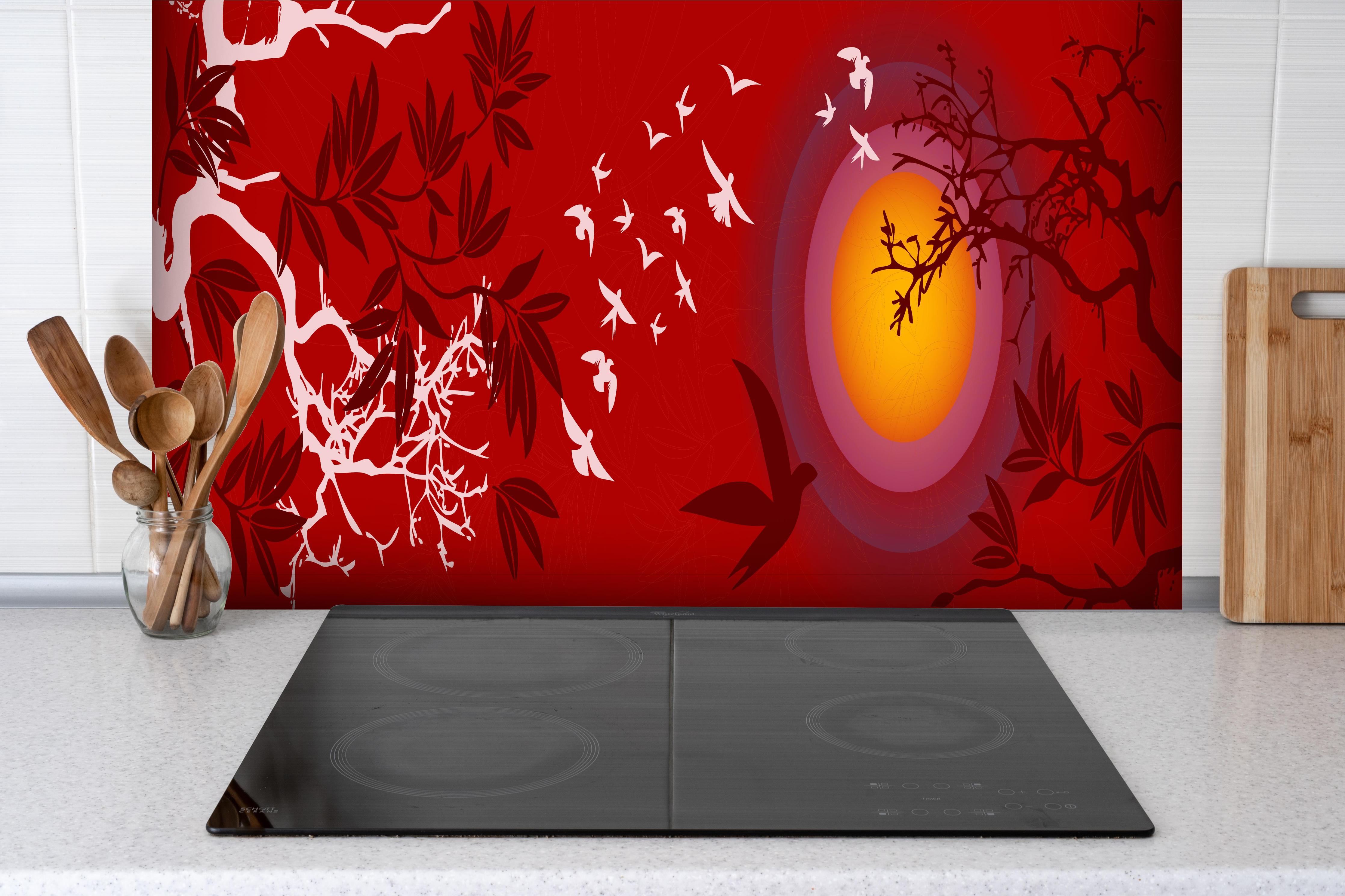 Spritzschutz - Asiatische Landschaft mit Sonnenuntergang hinter einem Cerankochfeld zwischen Holz-Kochutensilien