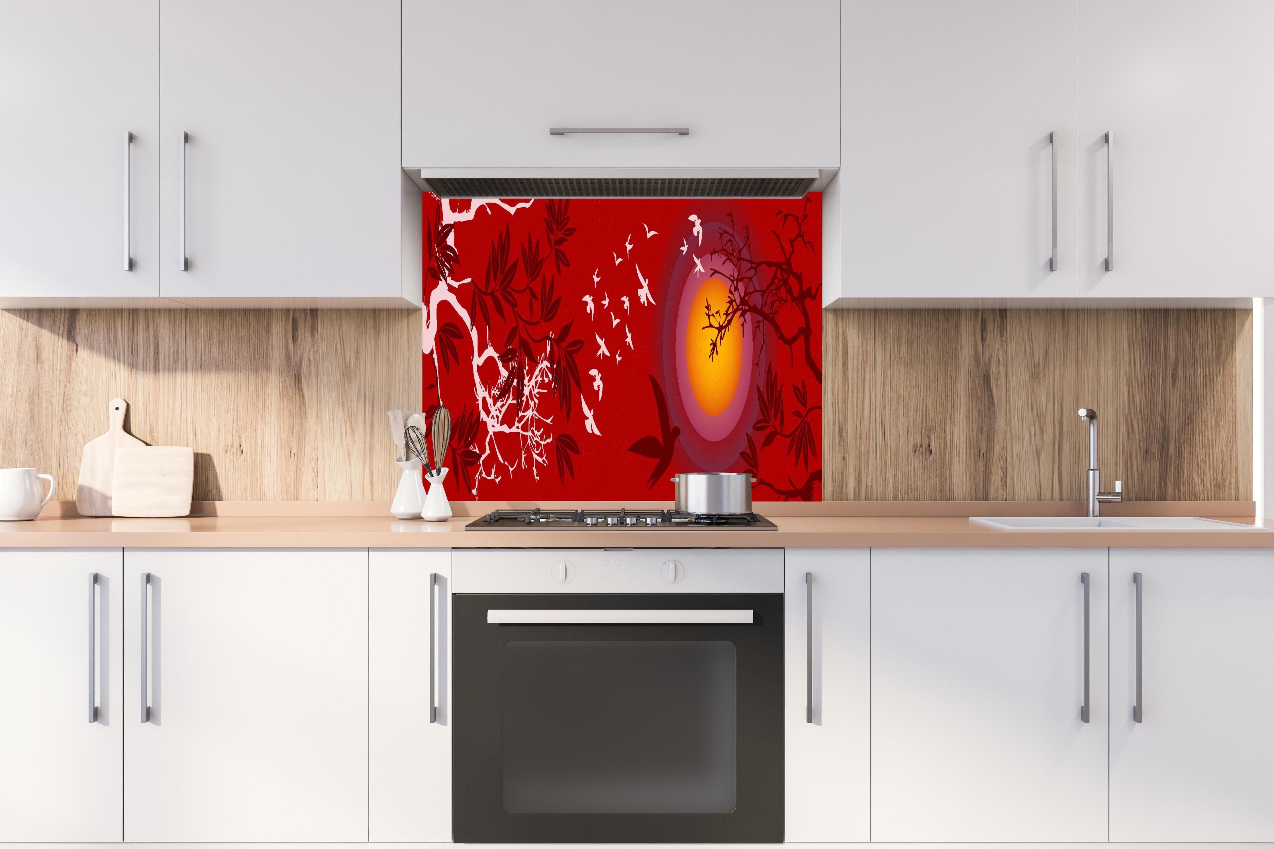 Spritzschutz - Asiatische Landschaft mit Sonnenuntergang hinter einem Cerankochfeld zwischen Holz-Kochutensilien