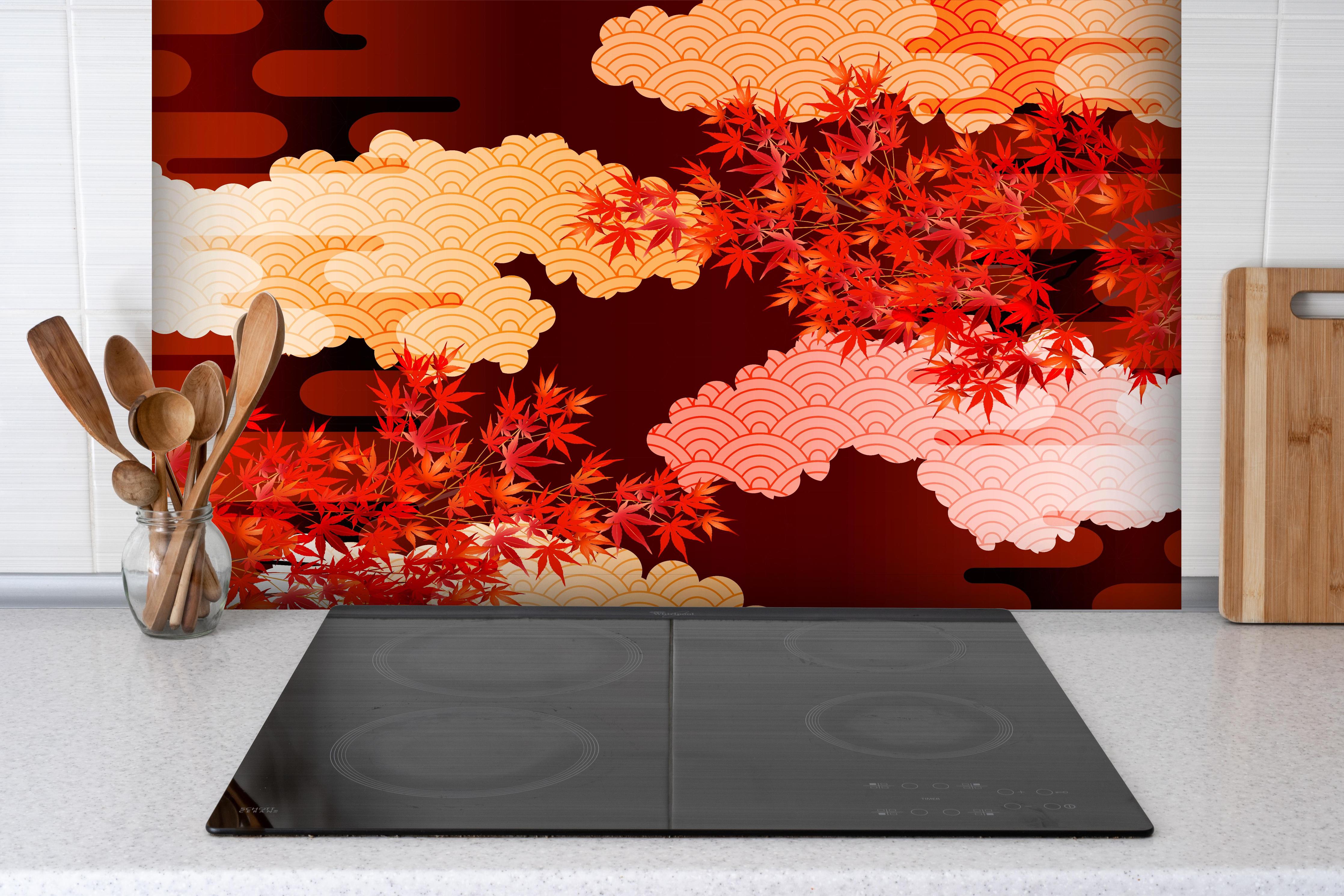 Spritzschutz - Ästhetische Herbstlaub- und Wolkenillustration hinter einem Cerankochfeld zwischen Holz-Kochutensilien