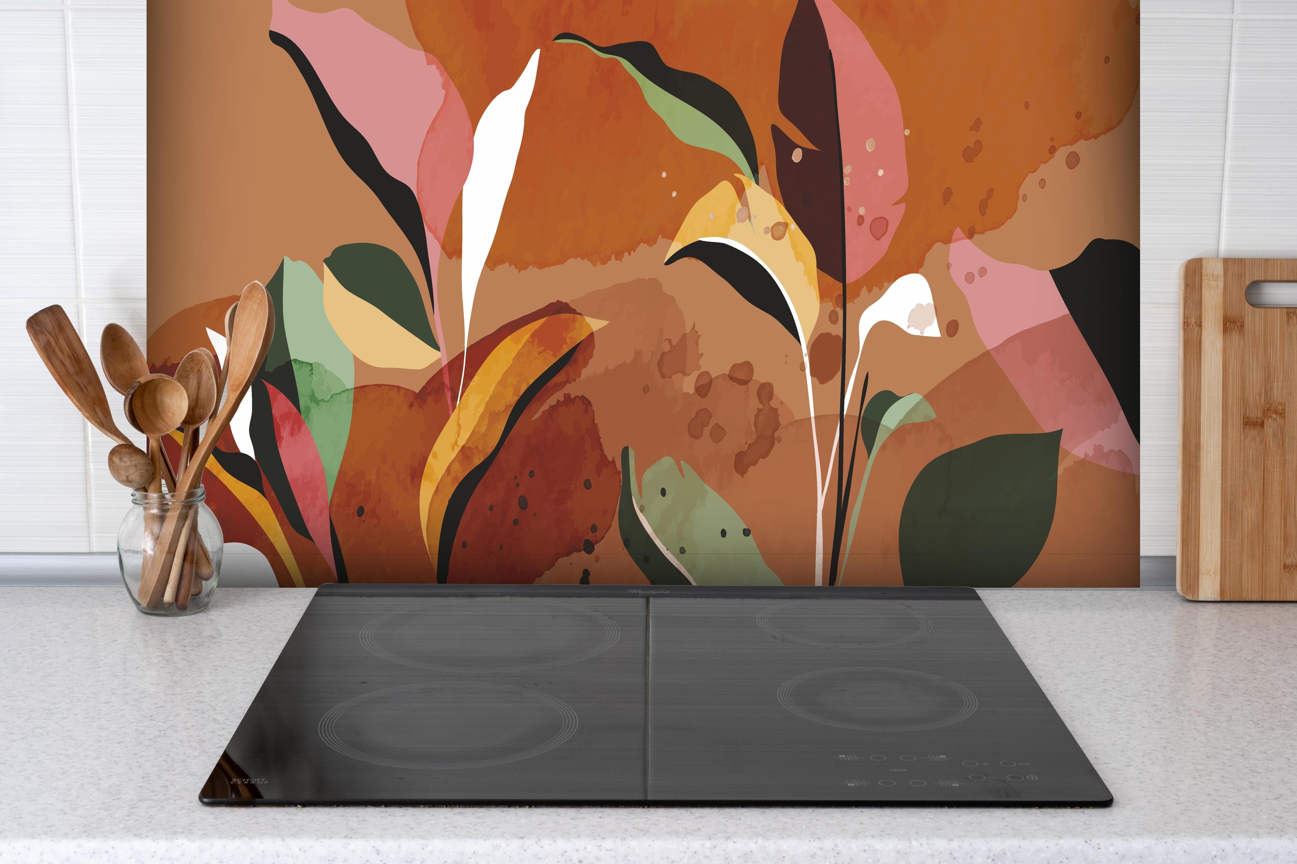 Spritzschutz - Bunte abstrakte Herbstblatt-Illustration hinter einem Cerankochfeld zwischen Holz-Kochutensilien