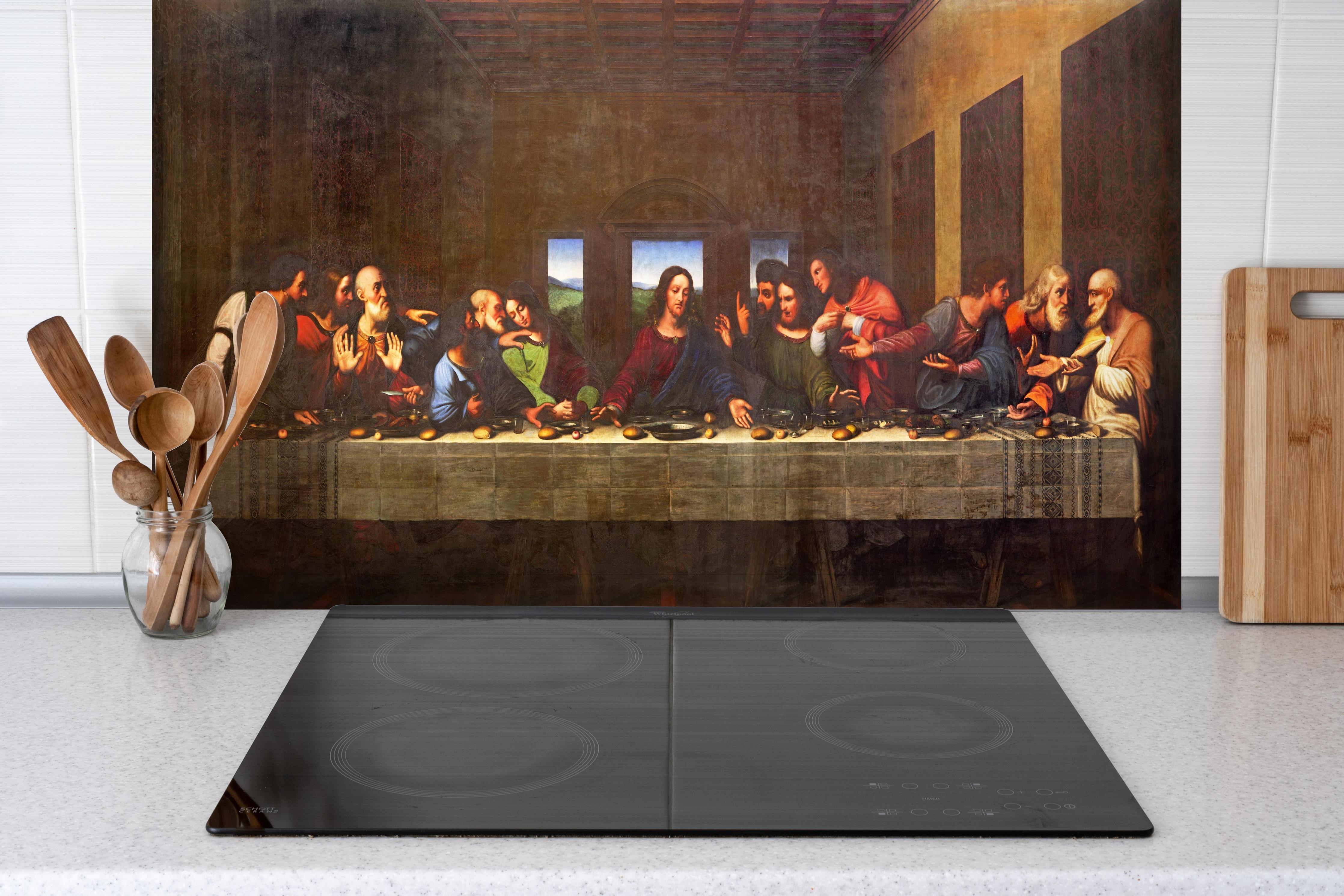 Spritzschutz - Das letzte Abendmahl hinter einem Cerankochfeld zwischen Holz-Kochutensilien