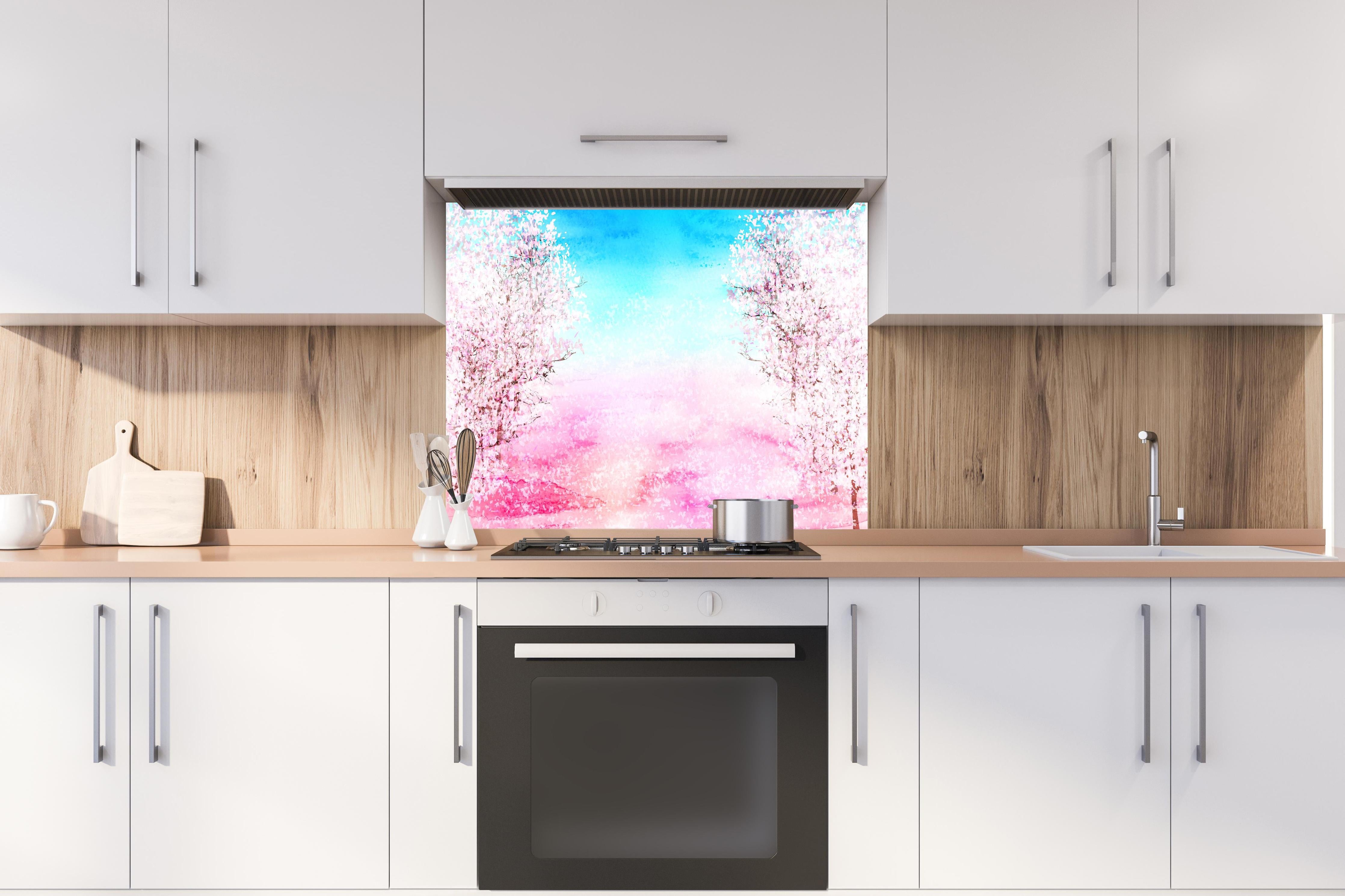 Spritzschutz - Frühlingsbaum Aquarell Rosa-Blau hinter einem Cerankochfeld zwischen Holz-Kochutensilien