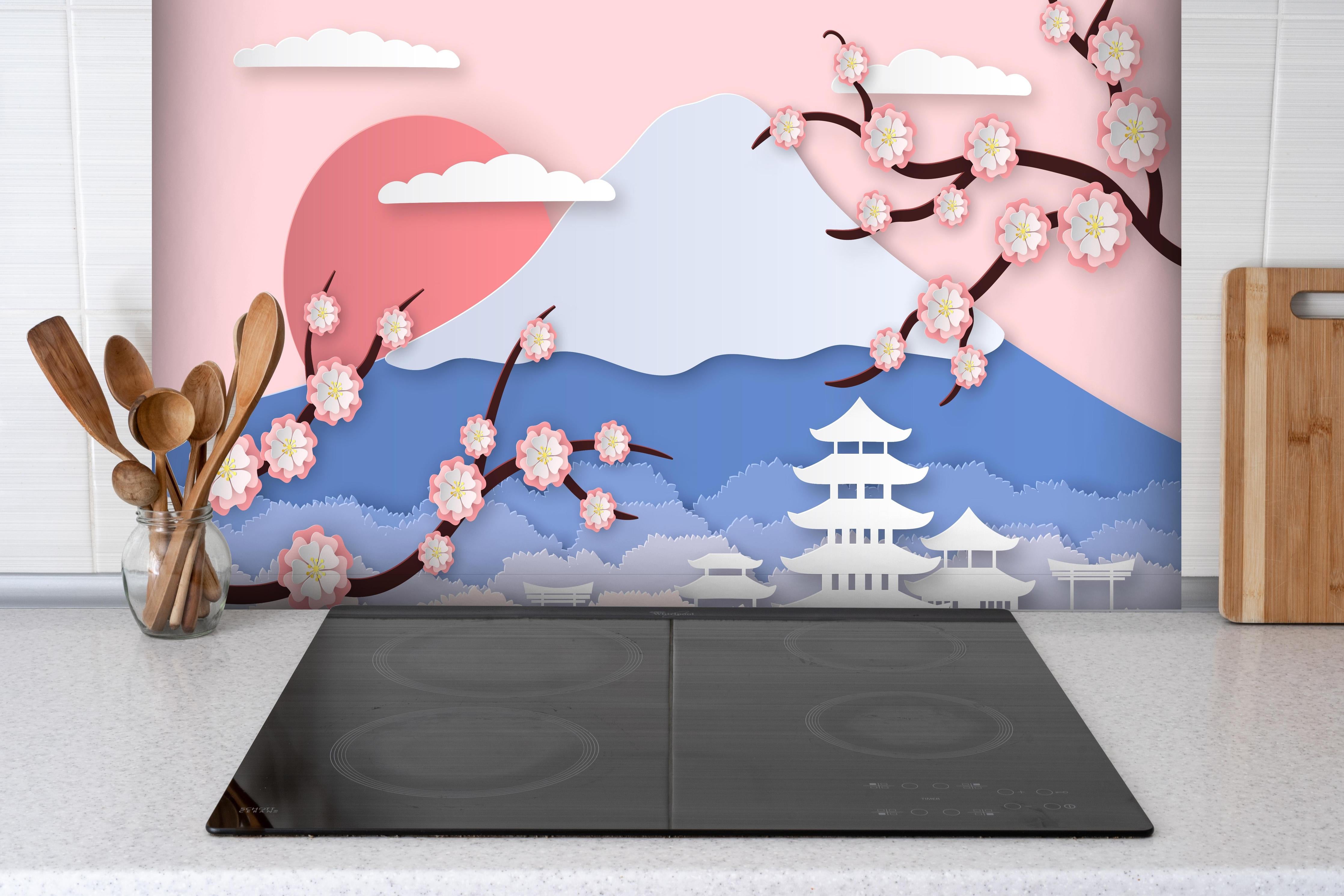 Spritzschutz - Fujiyama modern Style hinter einem Cerankochfeld zwischen Holz-Kochutensilien