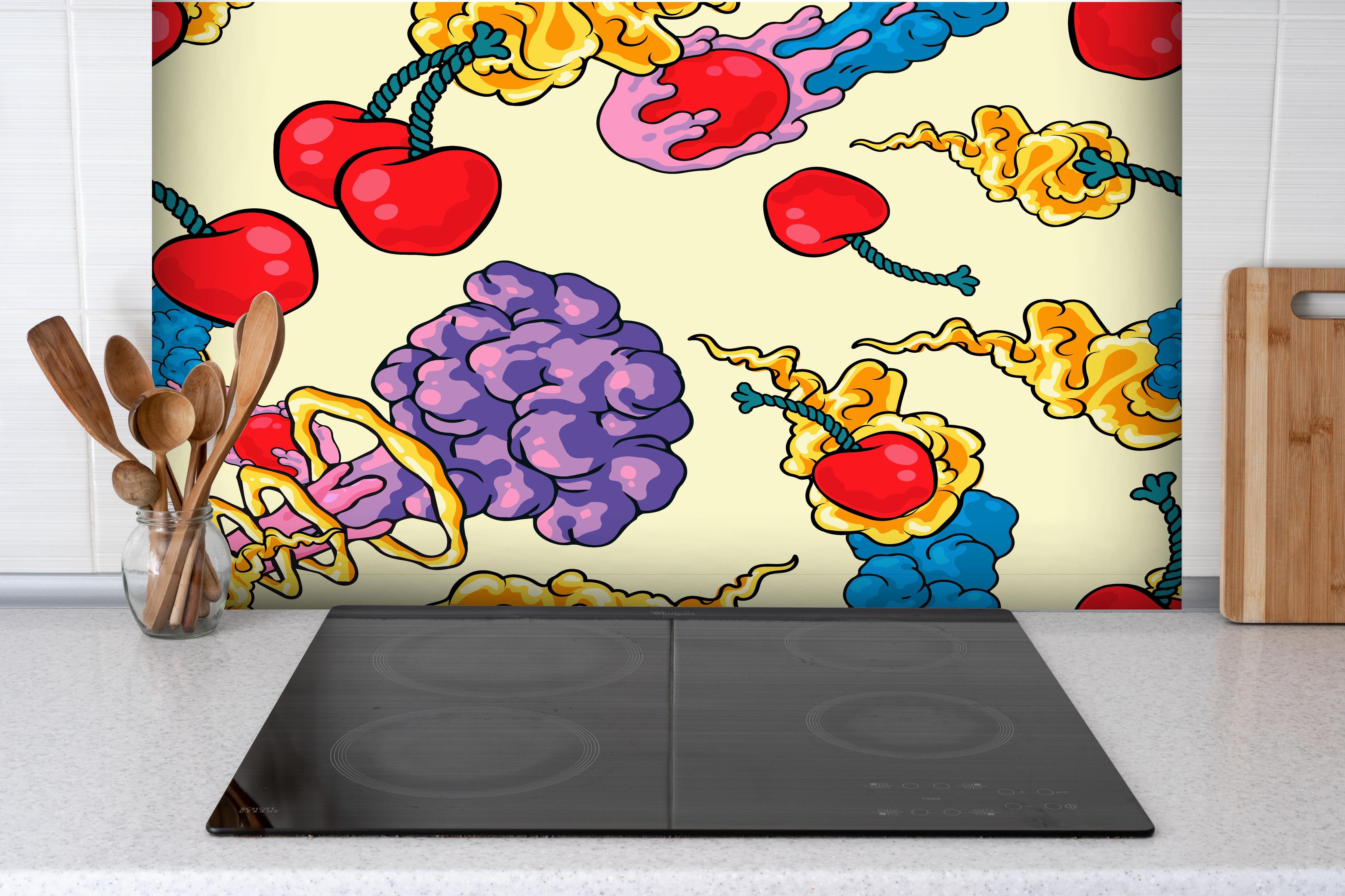 Spritzschutz - Kirschbomben Graphik hinter einem Cerankochfeld zwischen Holz-Kochutensilien