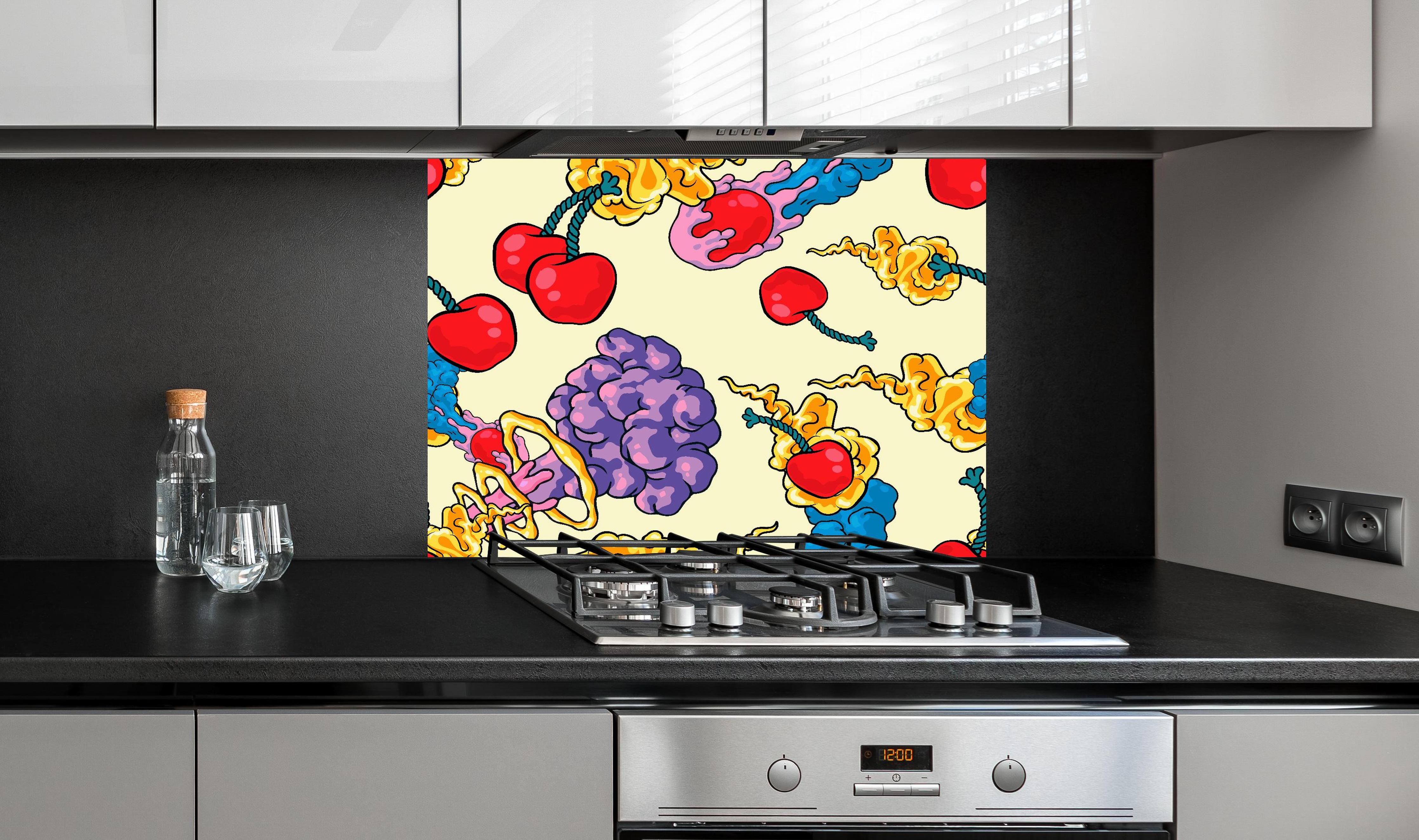 Spritzschutz - Kirschbomben Graphik hinter einem Cerankochfeld zwischen Holz-Kochutensilien