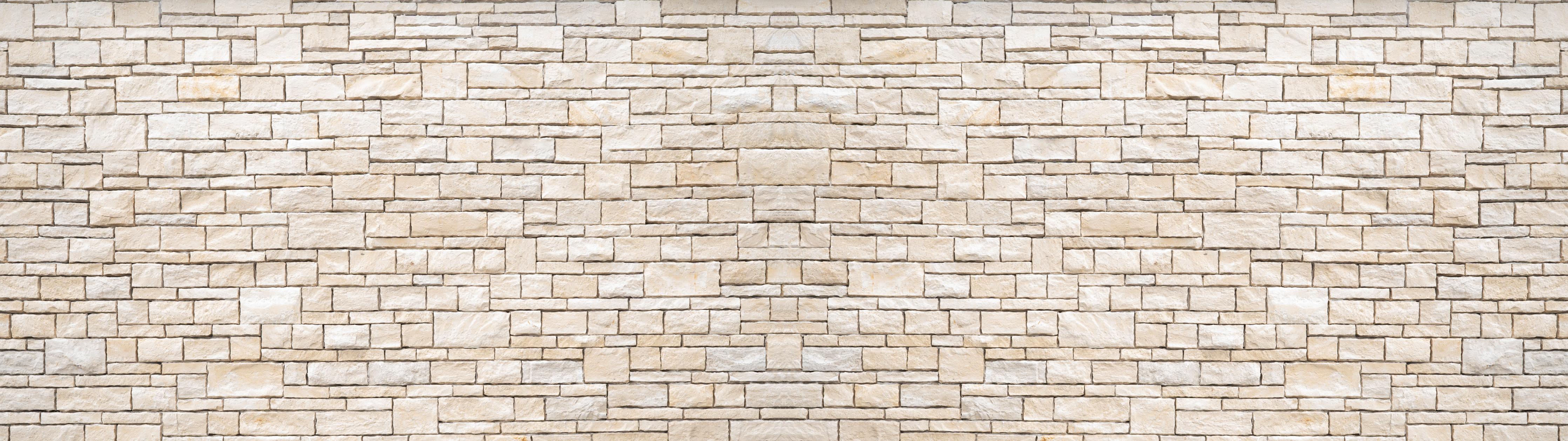 Spritzschutz-Natürliche beige Ziegelwand