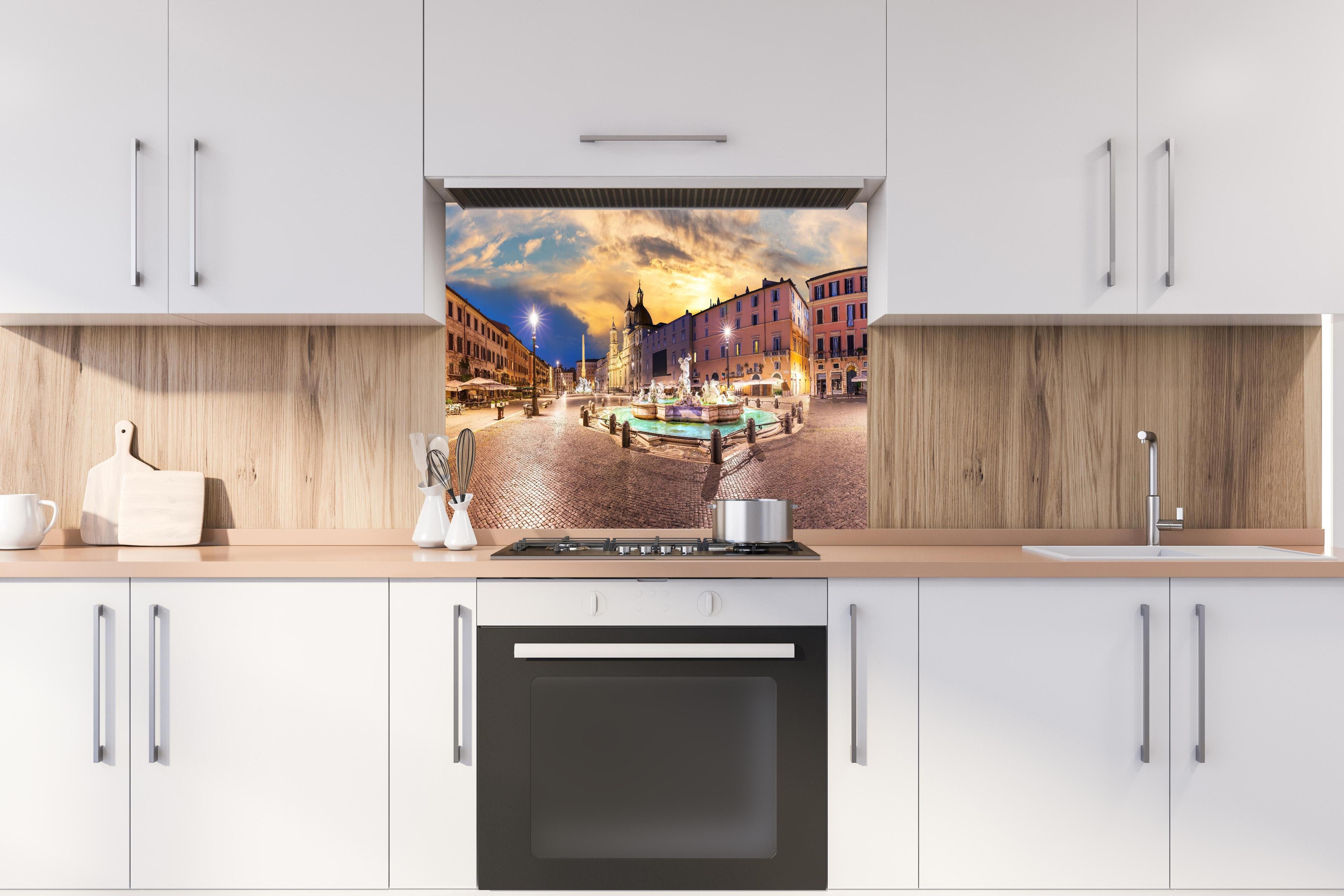 Spritzschutz - Neptunbrunnen auf der Piazza Navona hinter einem Cerankochfeld zwischen Holz-Kochutensilien