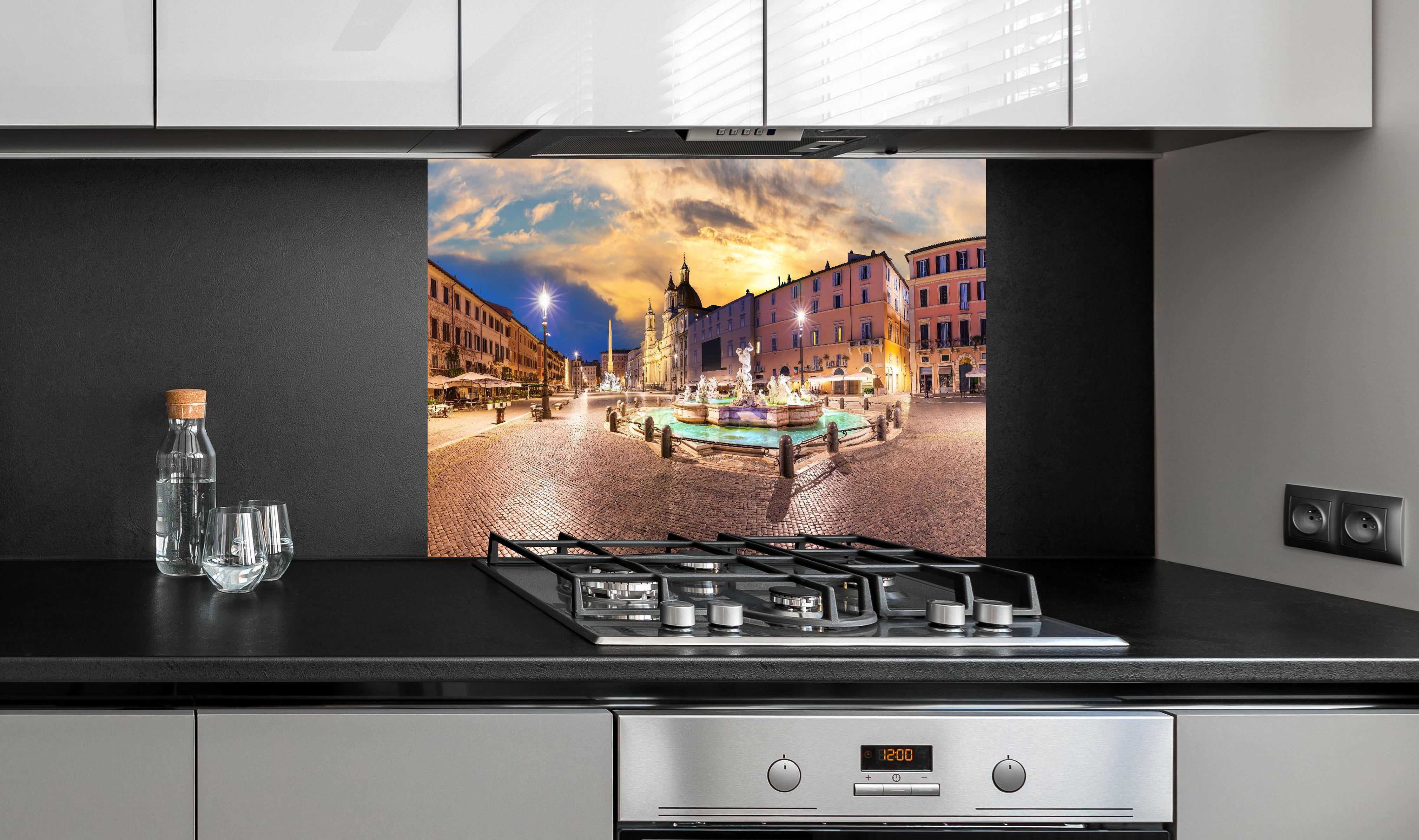 Spritzschutz - Neptunbrunnen auf der Piazza Navona hinter einem Cerankochfeld zwischen Holz-Kochutensilien