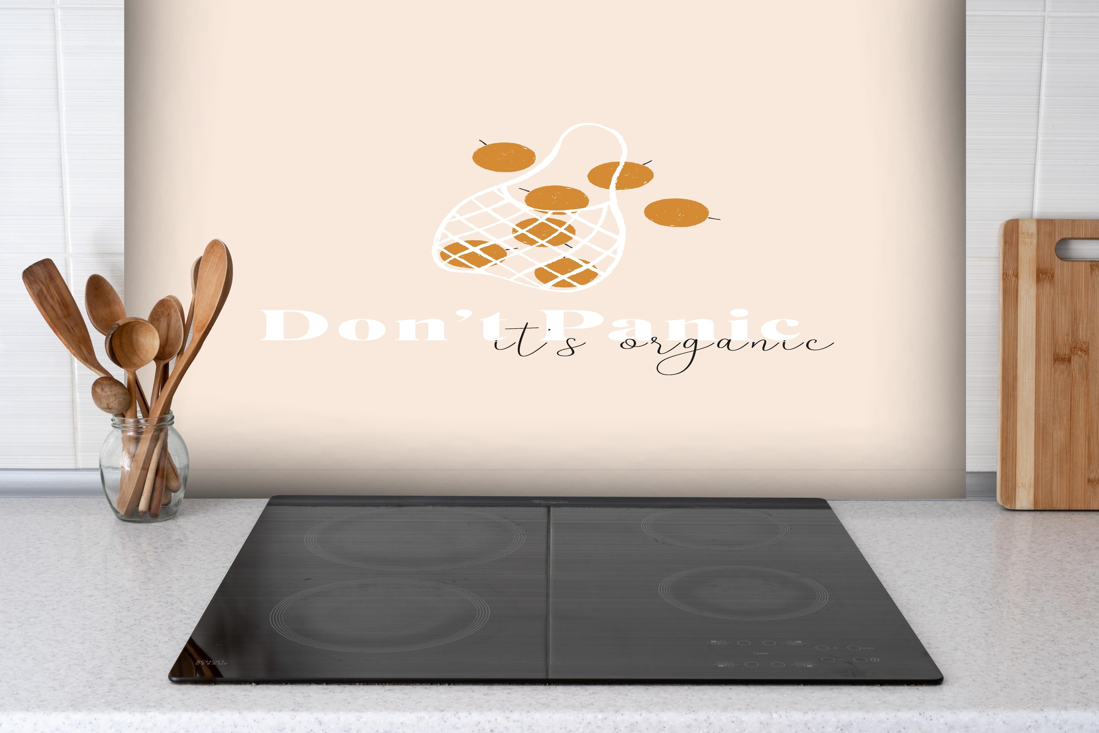 Spritzschutz - Organic Fruits Shopping Beige Inspiration hinter einem Cerankochfeld zwischen Holz-Kochutensilien