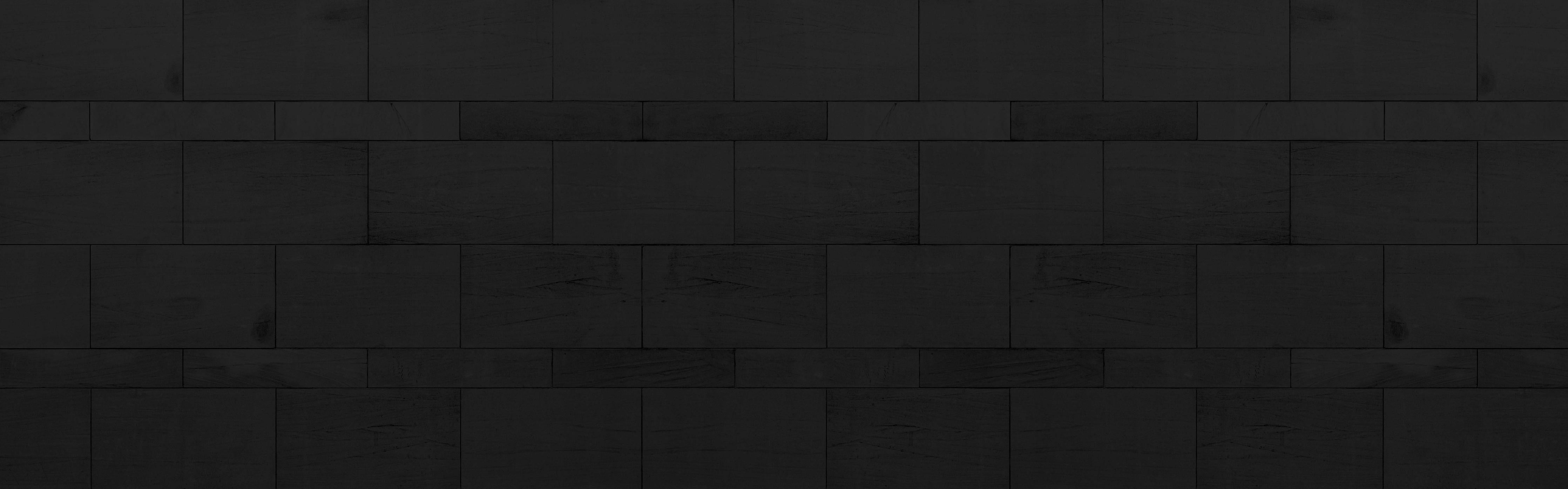 Spritzschutz-Panorama von schwarzer Granitwand