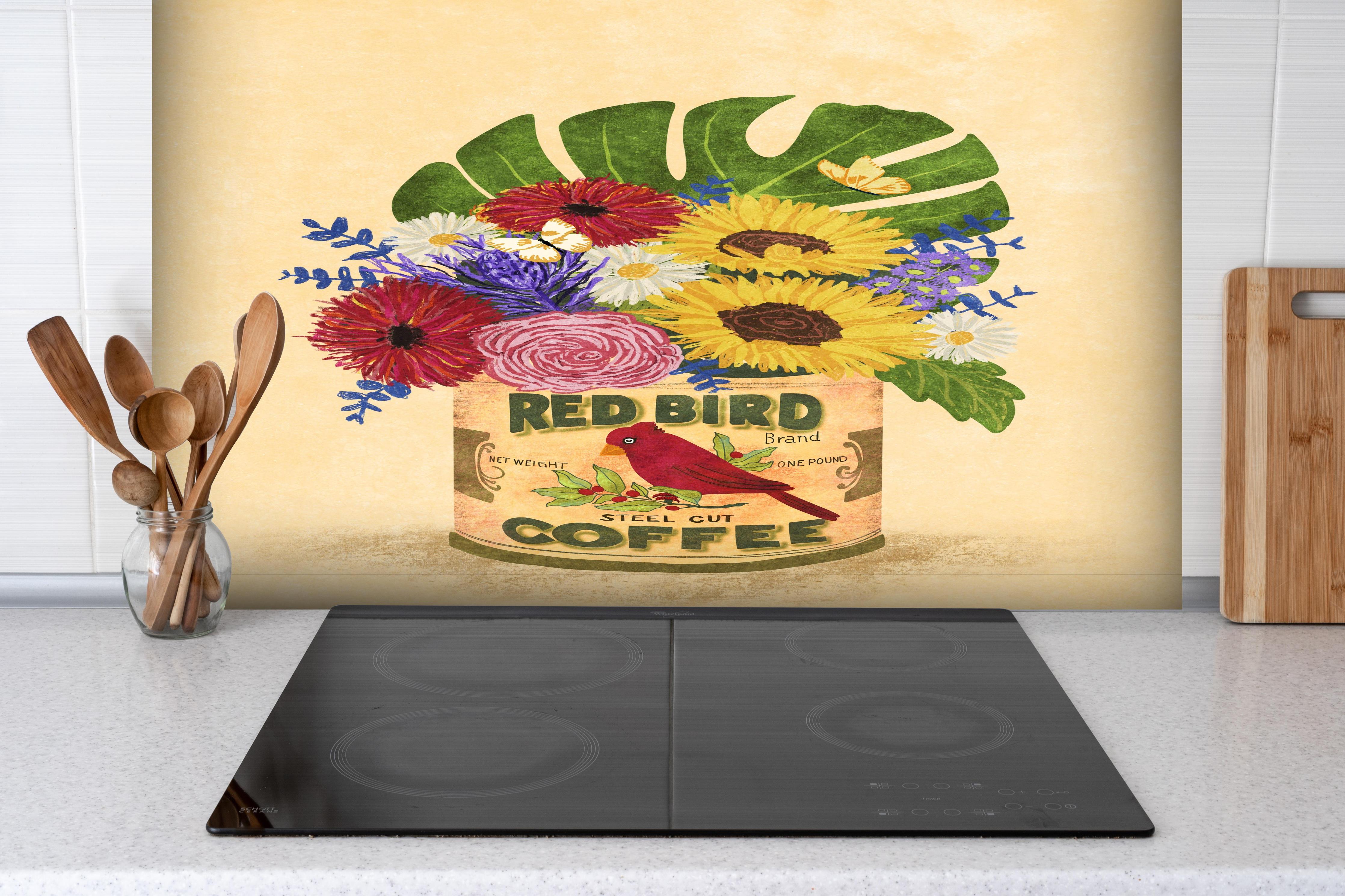 Spritzschutz - Retro Blumen in Vintage Kaffeedose hinter einem Cerankochfeld zwischen Holz-Kochutensilien