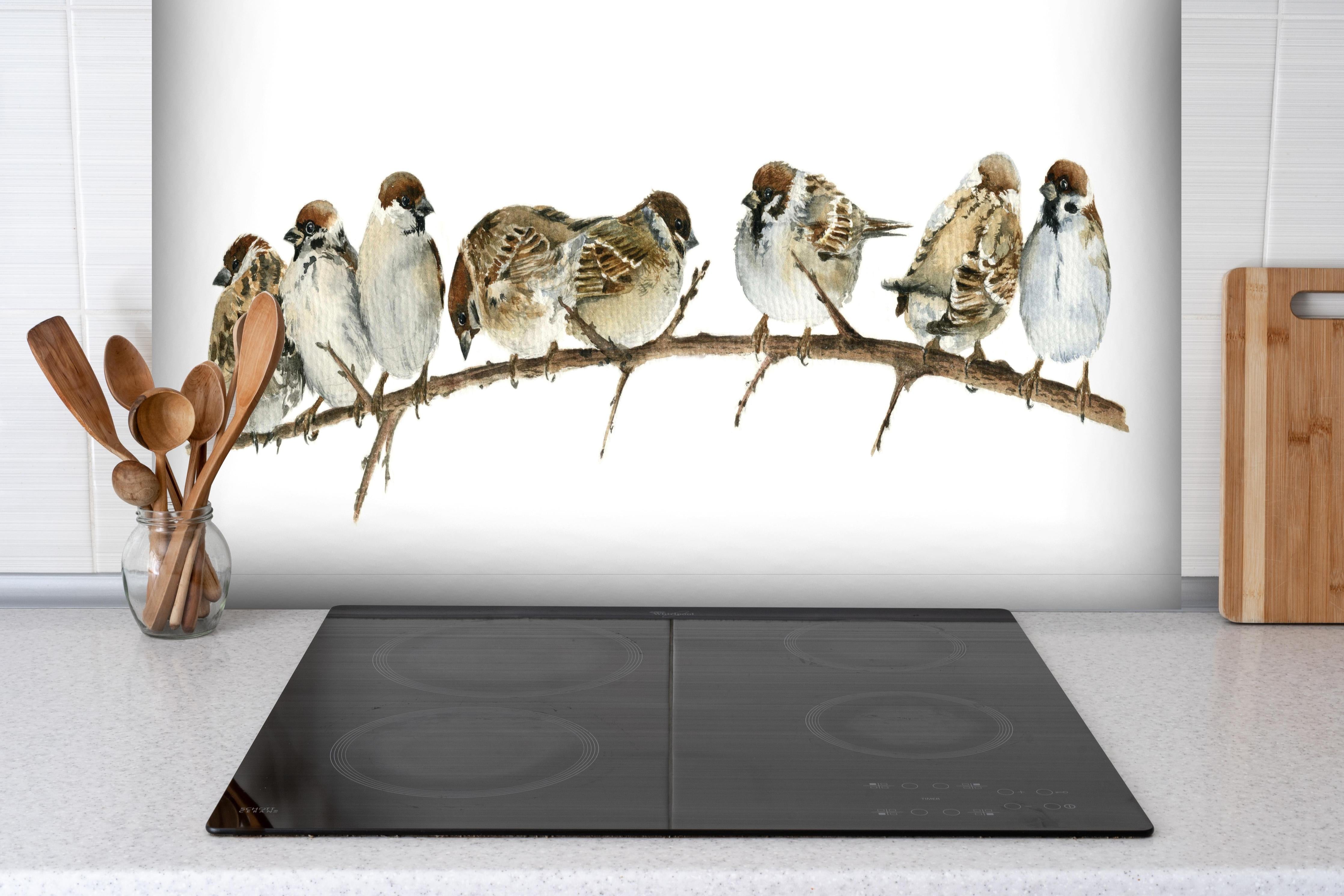 Spritzschutz - Spatzen auf einem Zweig hinter einem Cerankochfeld zwischen Holz-Kochutensilien