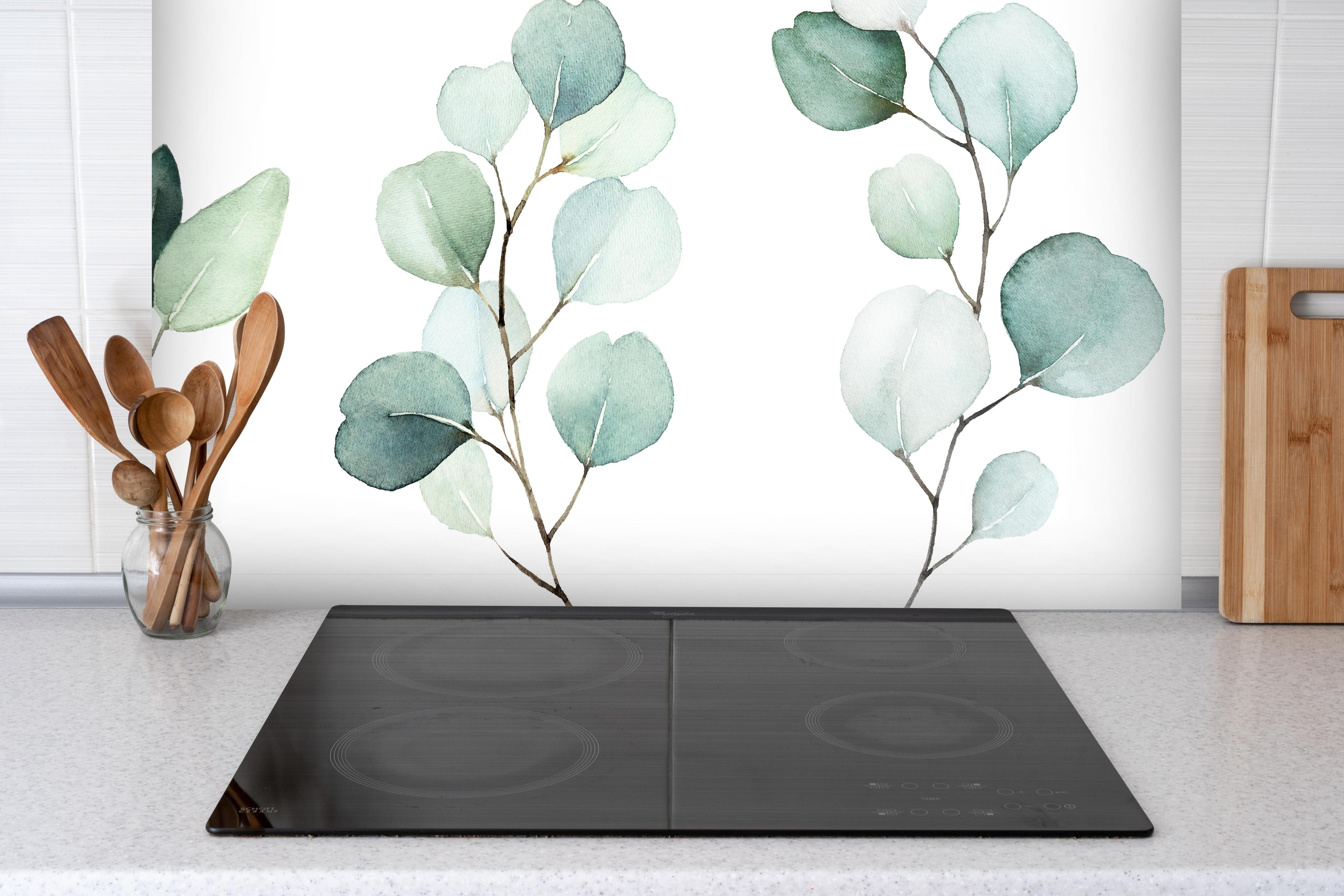 Spritzschutz - Aquarell von verschiedenen Ästen hinter einem Cerankochfeld zwischen Holz-Kochutensilien