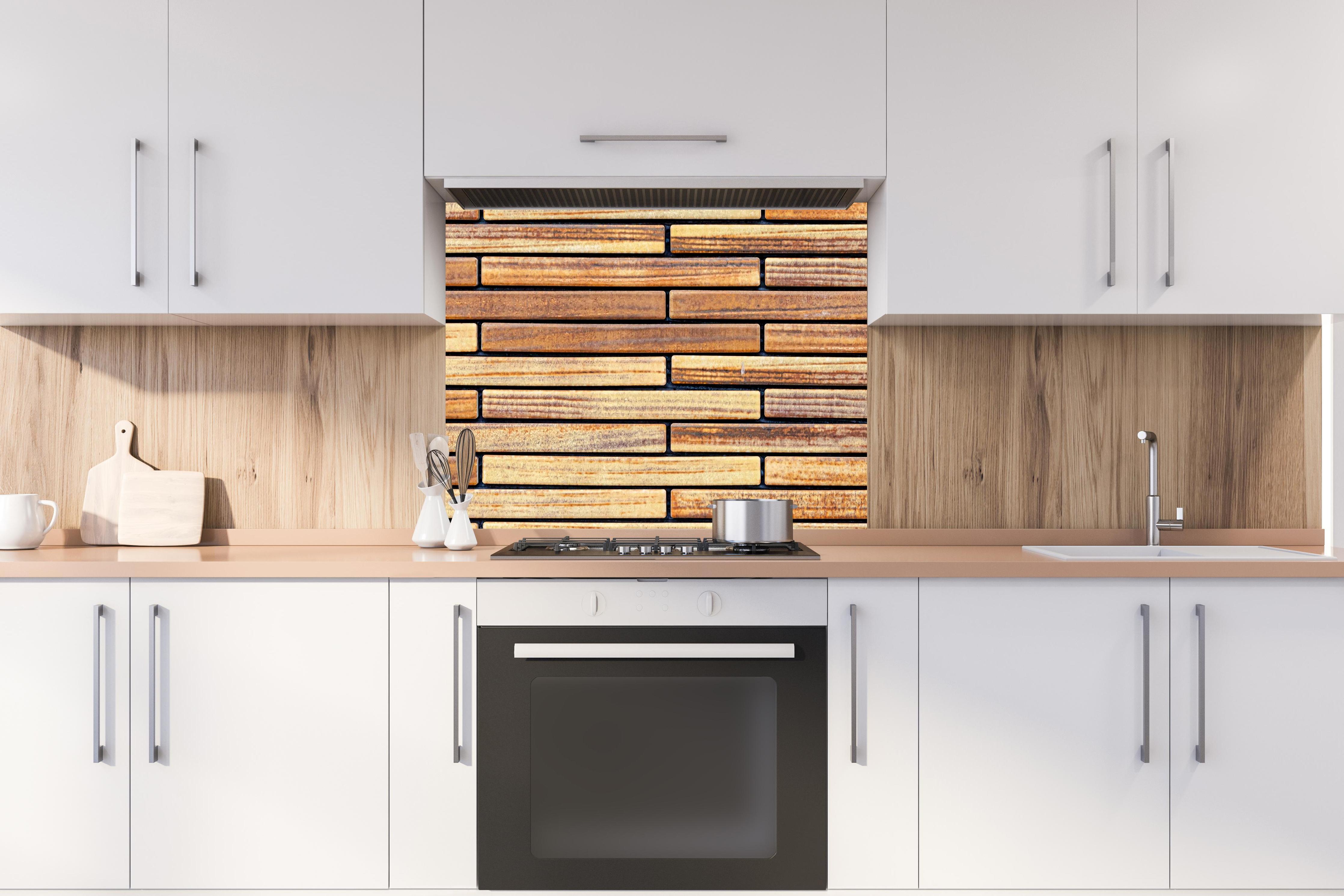 Spritzschutz - Brauner Sandstein Ziegelwand Muster hinter stilvollem Gasherd unter Dunstabzugshaube