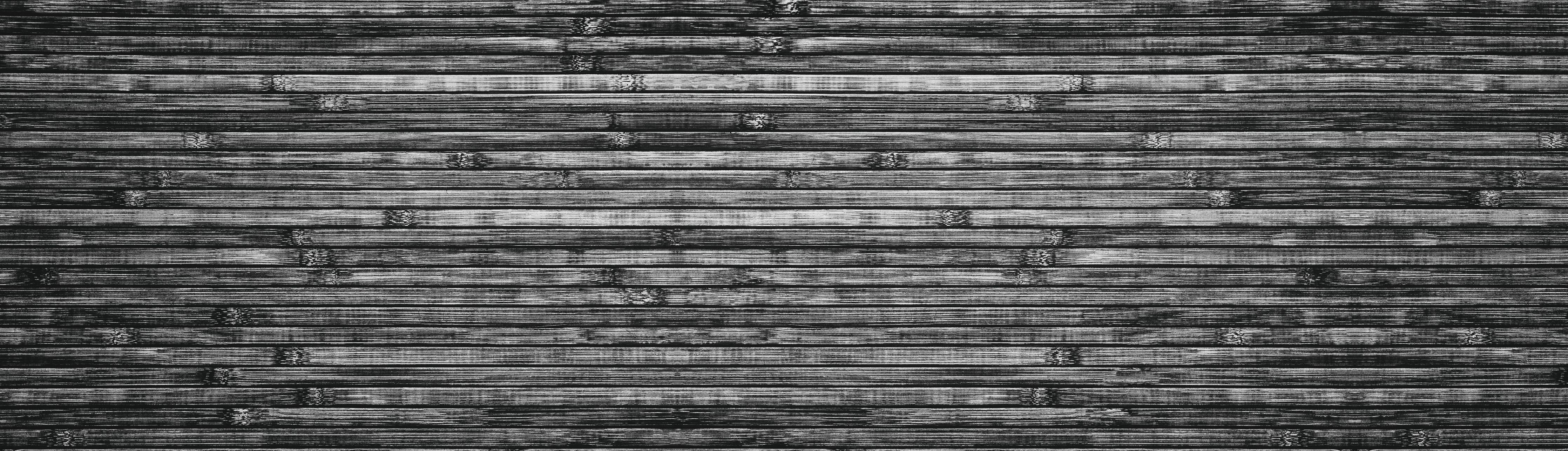 Spritzschutz-Breite schwarze und weiße hölzerne Hintergrund