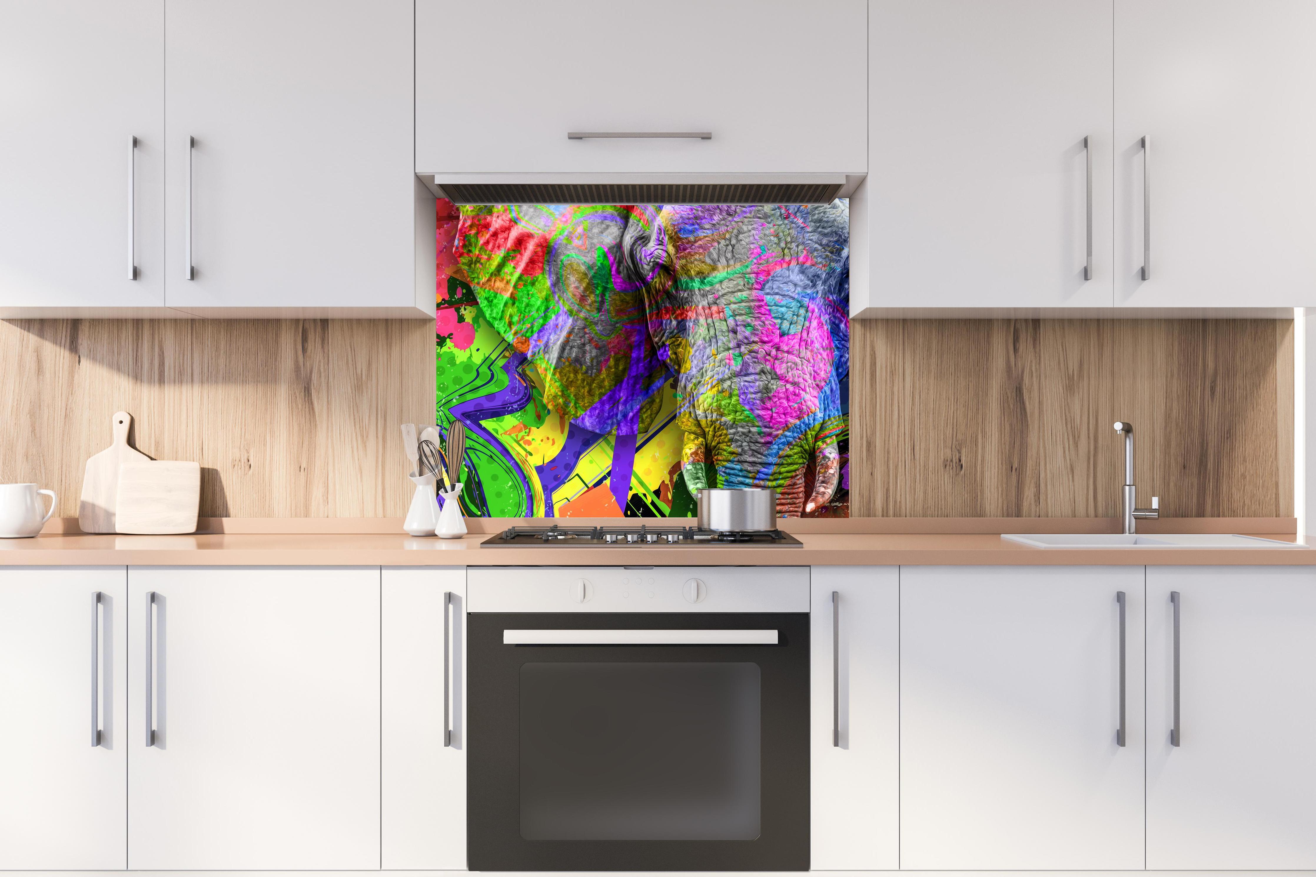 Spritzschutz - Bunter abstrakter Elefantenkopf hinter stilvollem Gasherd unter Dunstabzugshaube