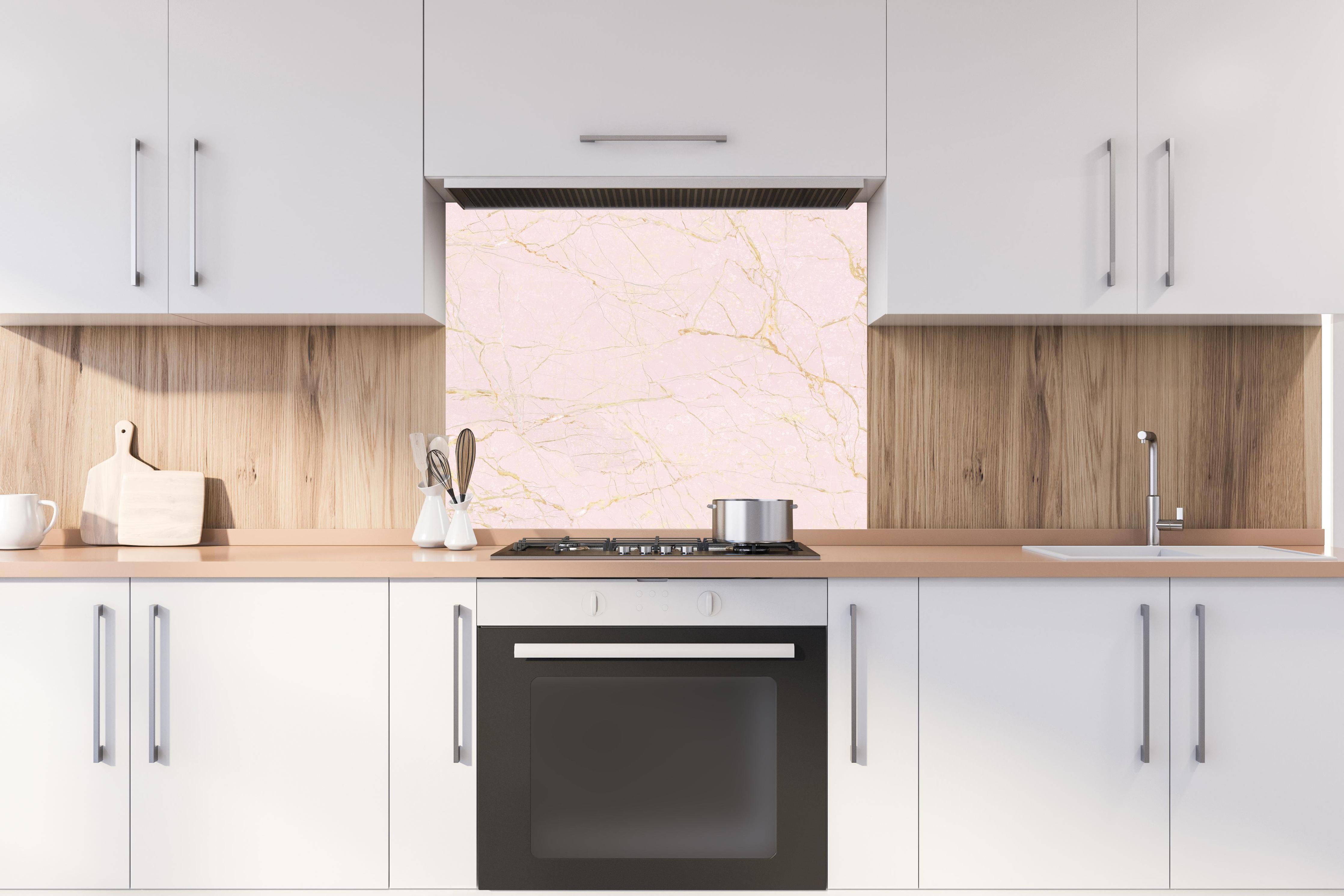 Spritzschutz - Rosa-Gold Marmor hinter stilvollem Gasherd unter Dunstabzugshaube