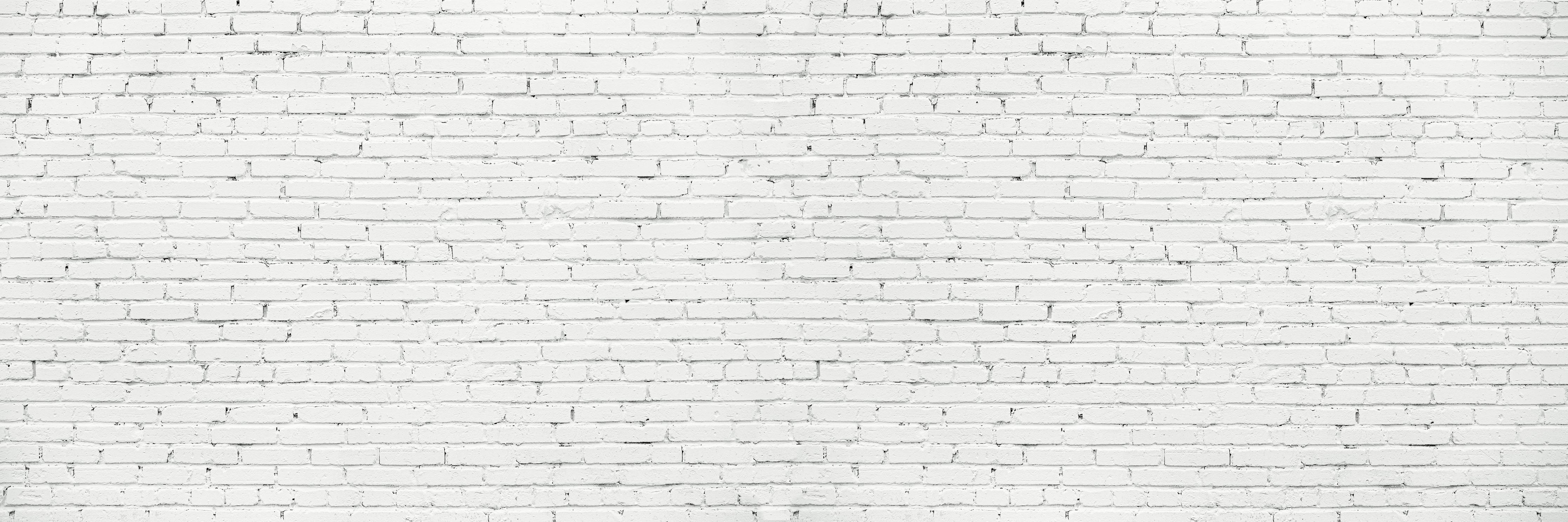 Spritzschutz-Weiße lange Backsteinfassade