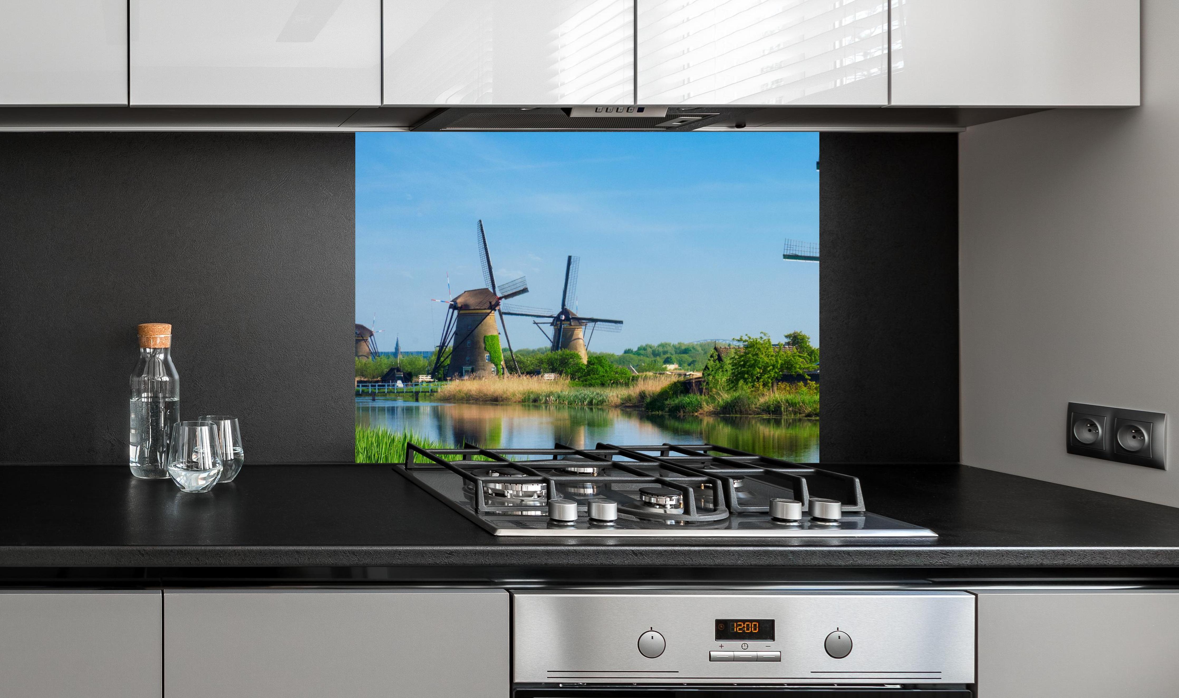Spritzschutz - Windmühlen in Kinderdijk - Holland an edler Anthrazit-Wand hinter silbernem Gasherd