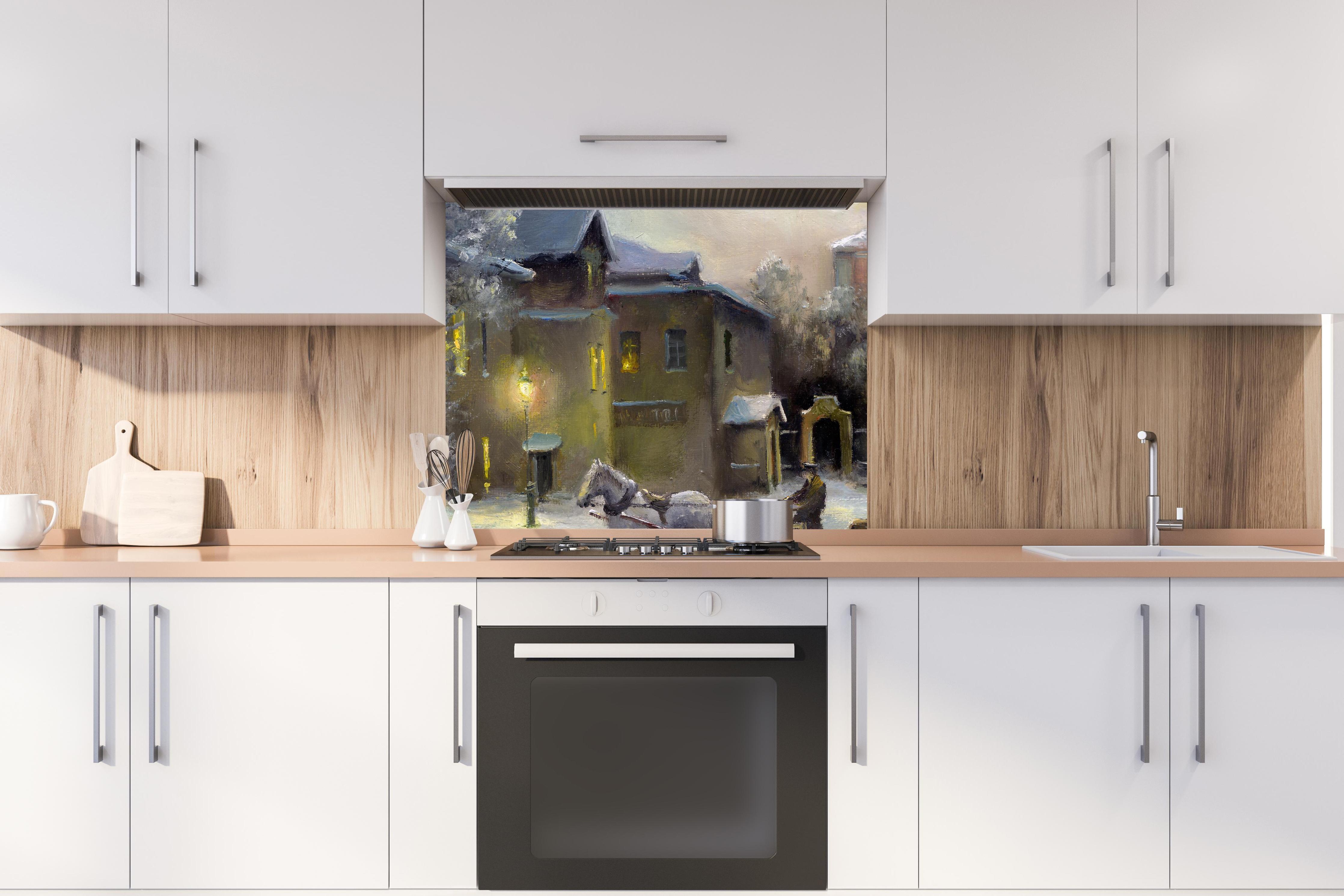 Spritzschutz - ländliches Dorf im Winter hinter stilvollem Gasherd unter Dunstabzugshaube