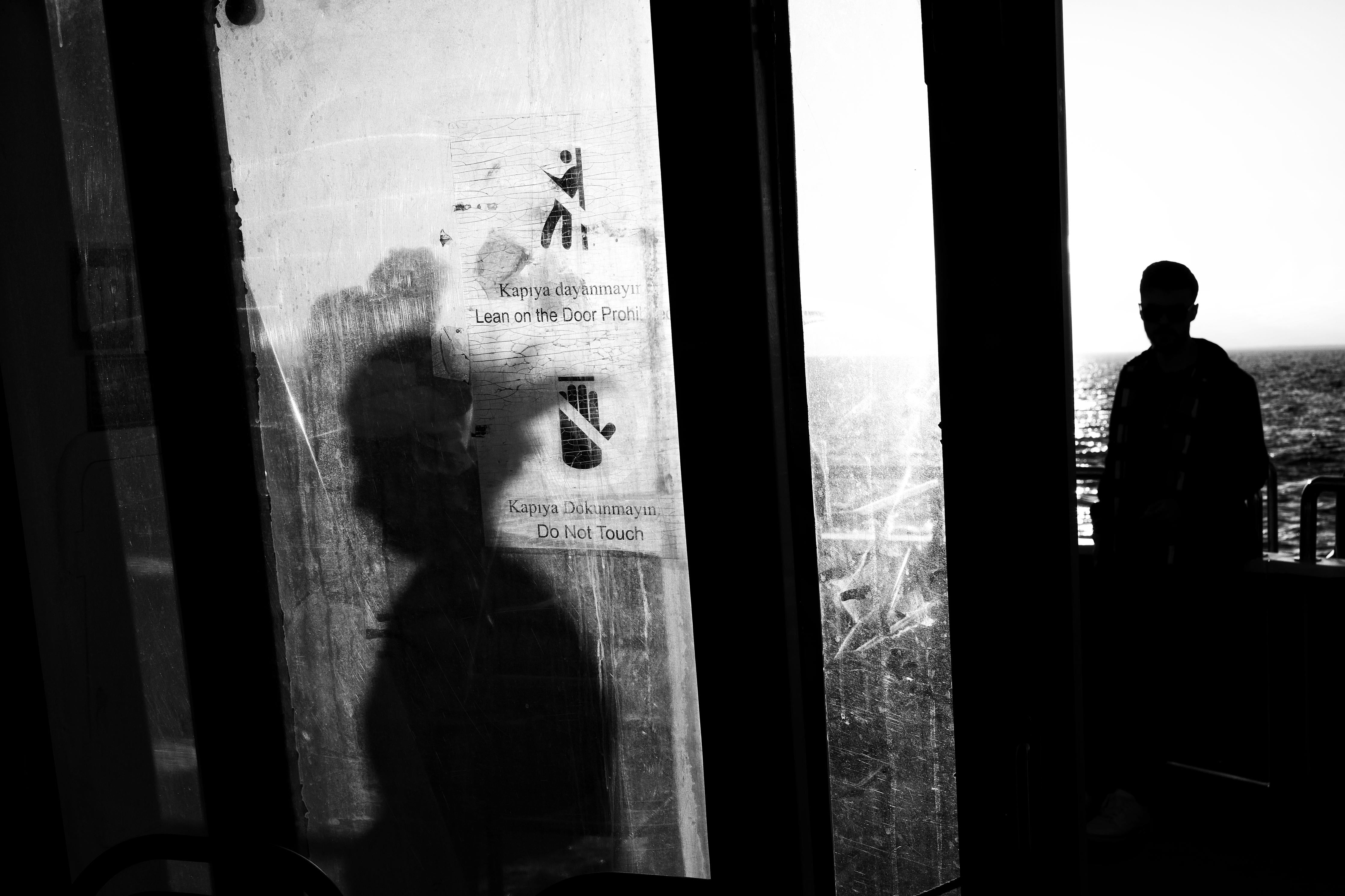 Spritzschutz-Städtisches Bild mit Silhouetten