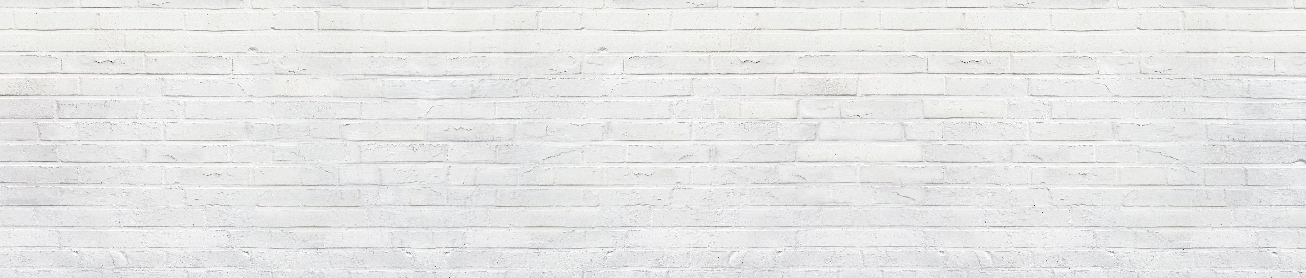 Spritzschutz-Weiß bemalte Steinmauer