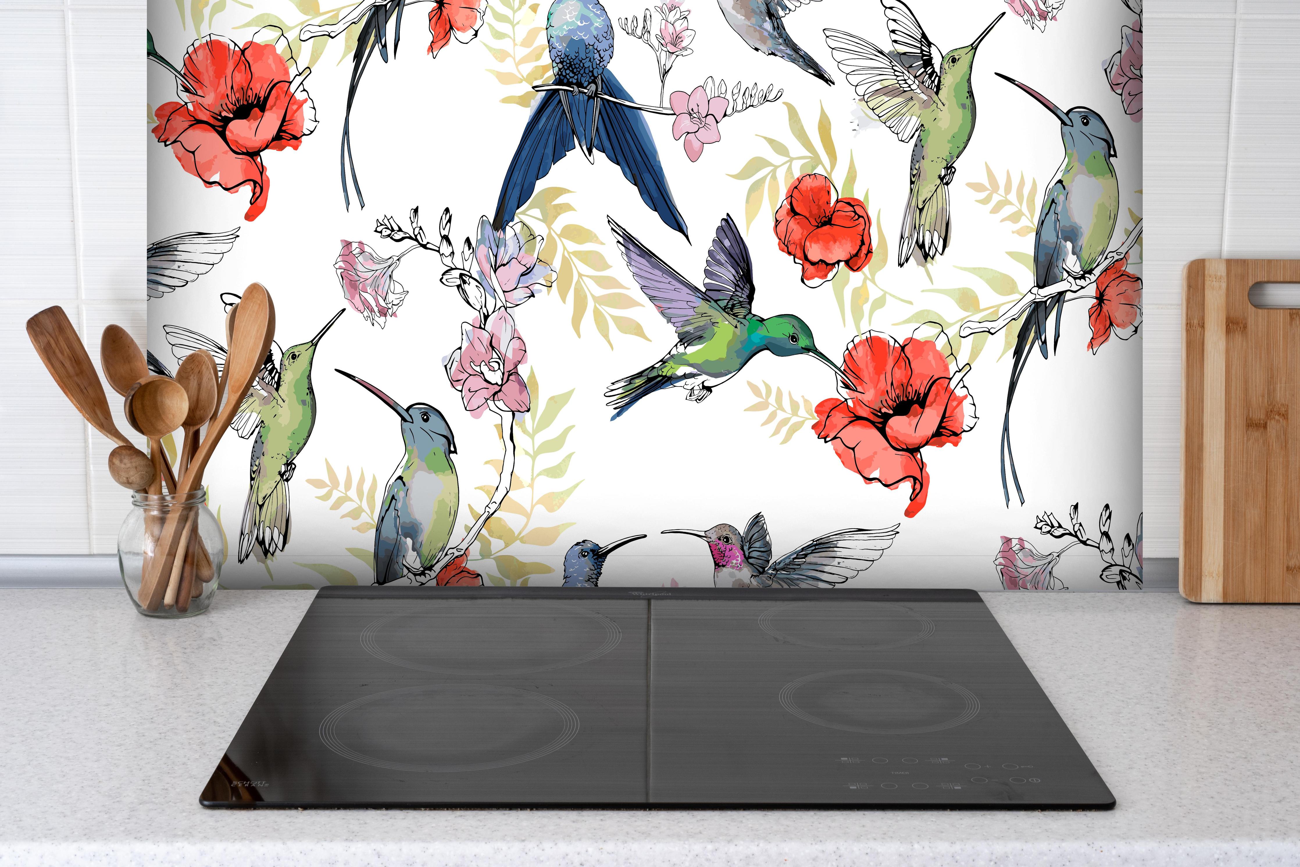 Spritzschutz - Wunderschöne Kolibris hinter einem Cerankochfeld zwischen Holz-Kochutensilien