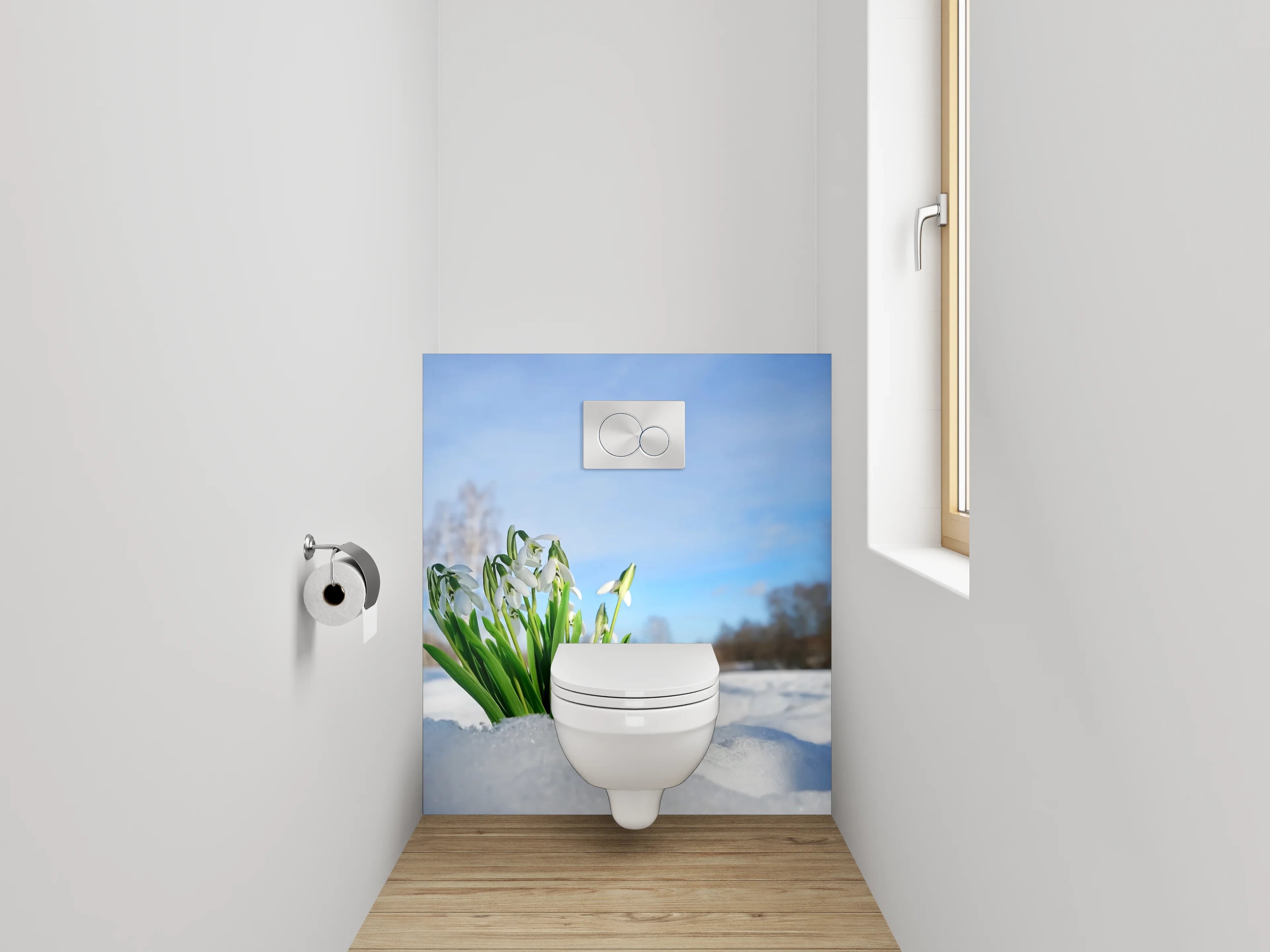 WC-Rückwand - Schneeglöckchen im Schnee unter blauem Himmel
