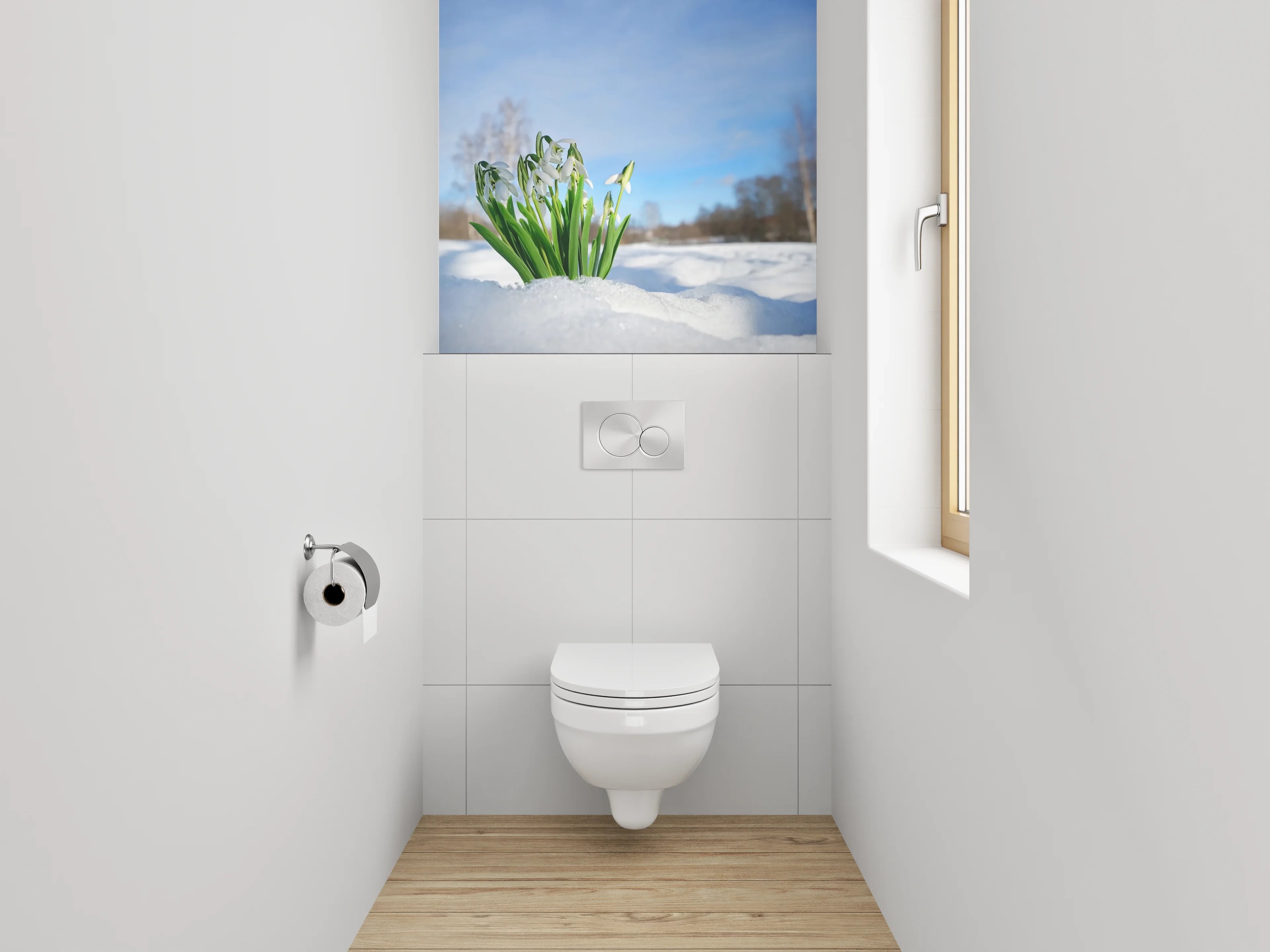 WC-Rückwand - Schneeglöckchen im Schnee unter blauem Himmel