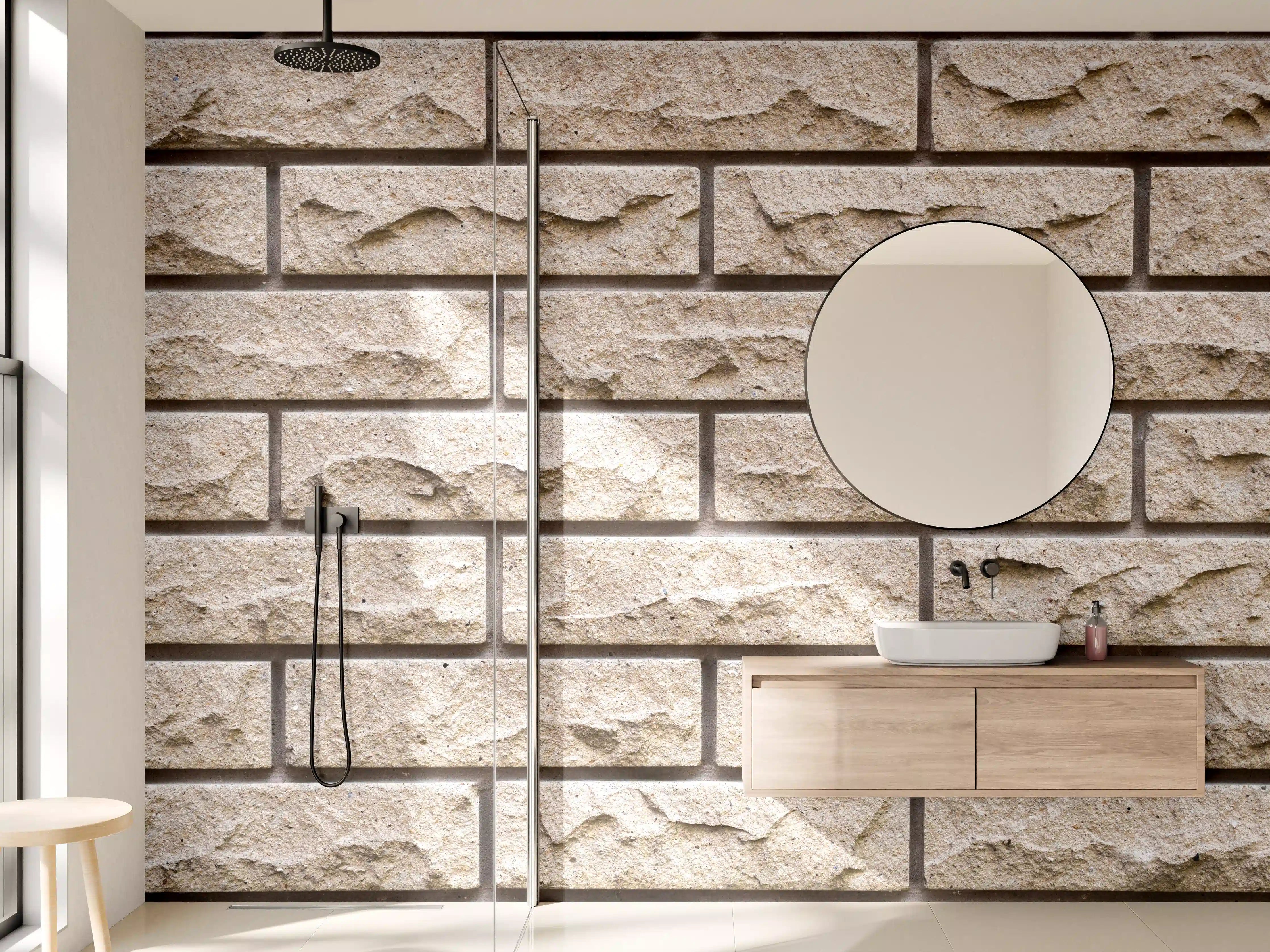 Wandverkleidung Bad - Graue Sandsteinmauer mit weißer Textur