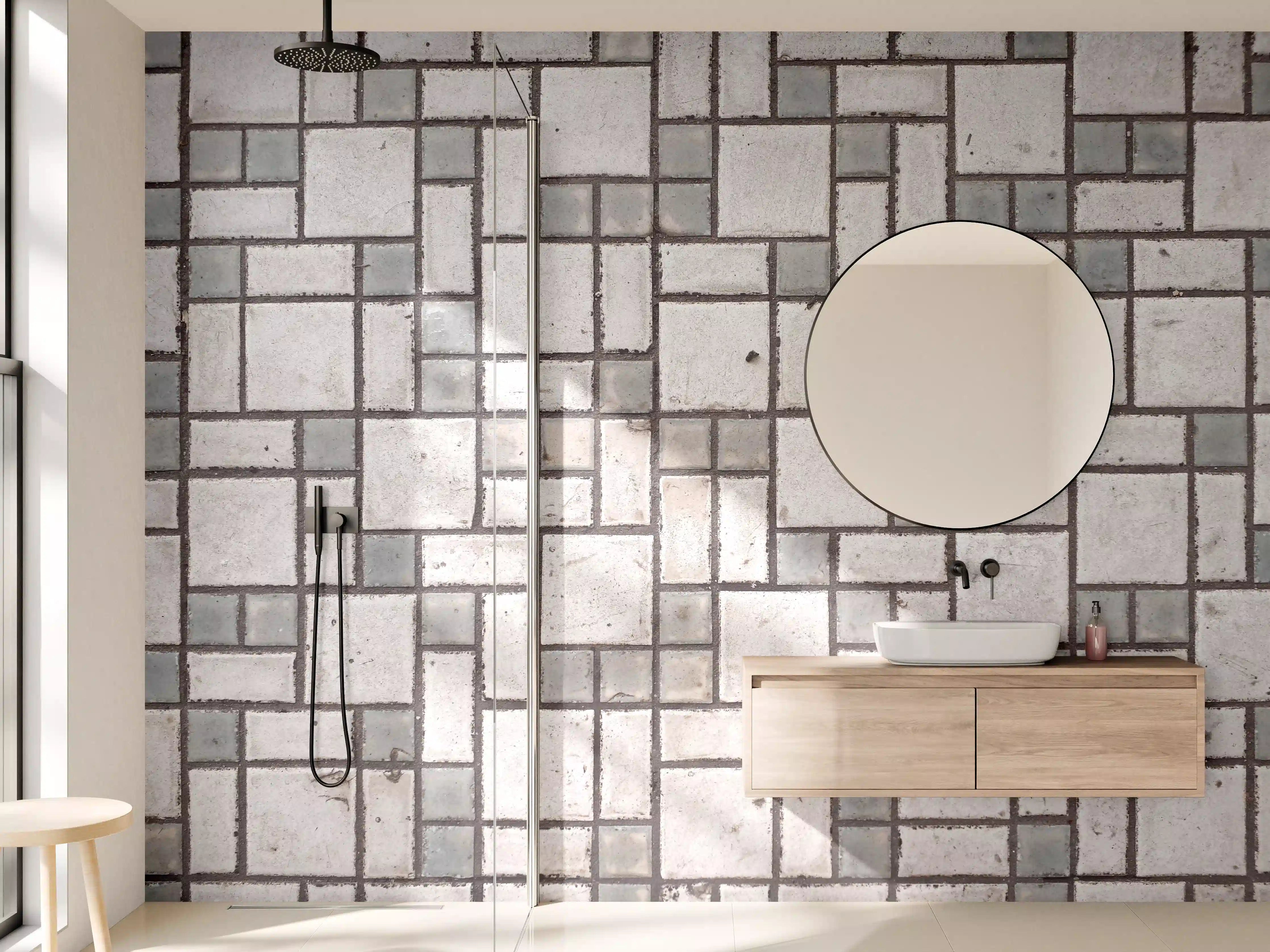 Wandverkleidung Bad - Grauer Pflastersteinboden im Mosaik-Design