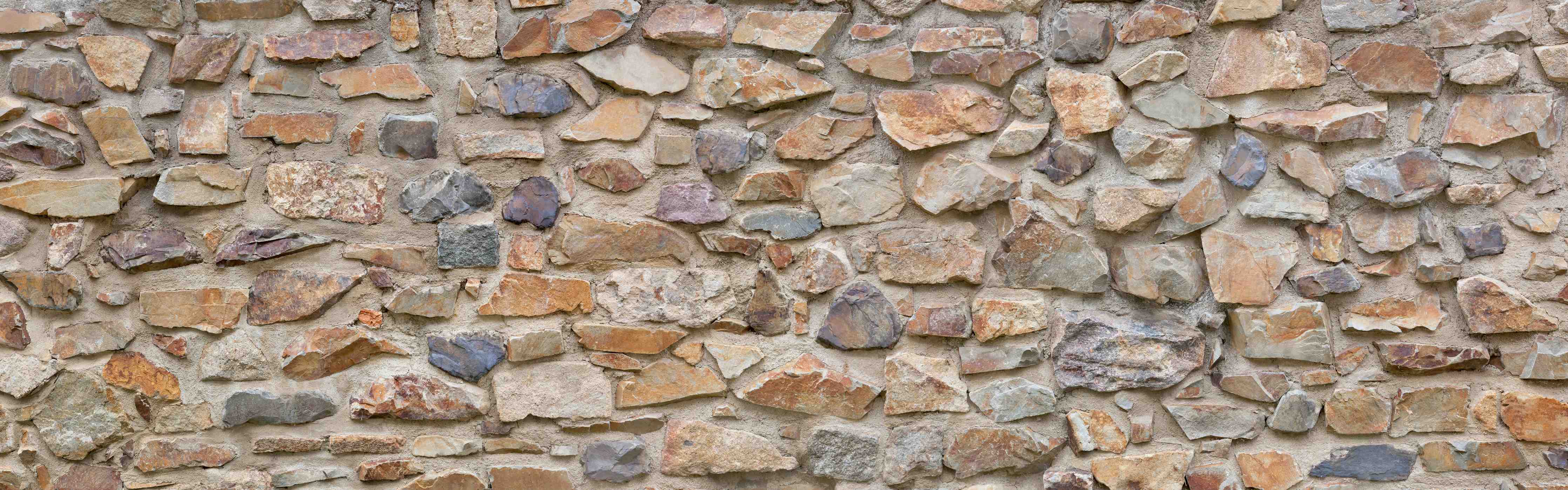 Wandverkleidung Bad-Natürliche Steinmauer mit warmen Tönen