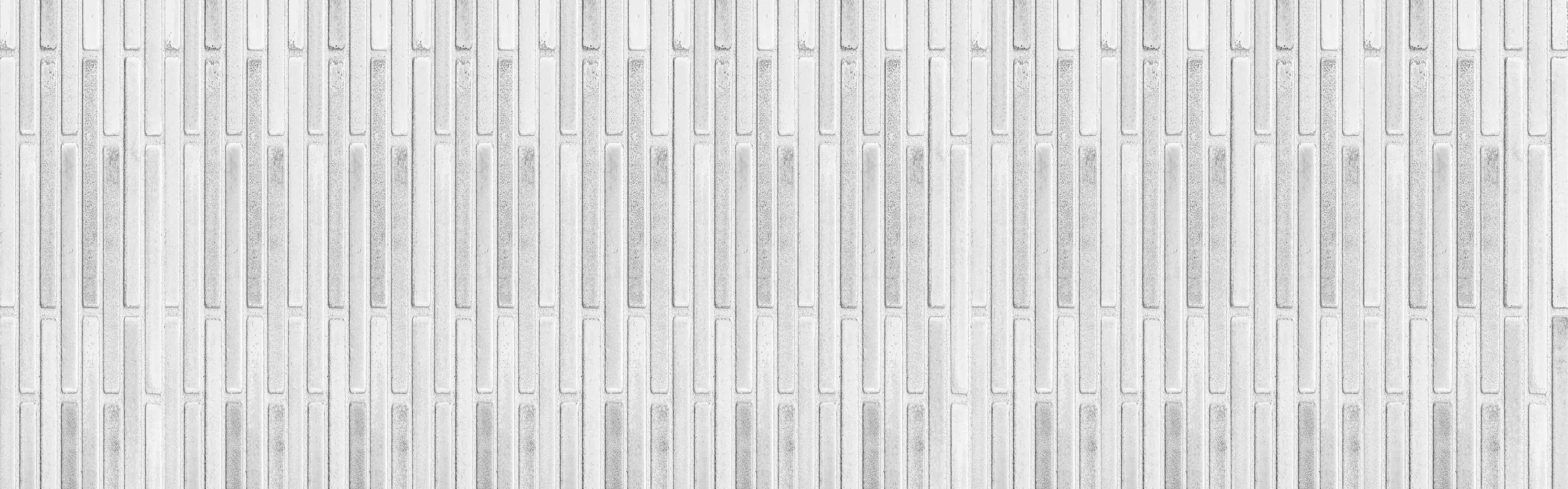 Wandverkleidung Bad-Panorama der weißen Steinwand mit Streifen Textur