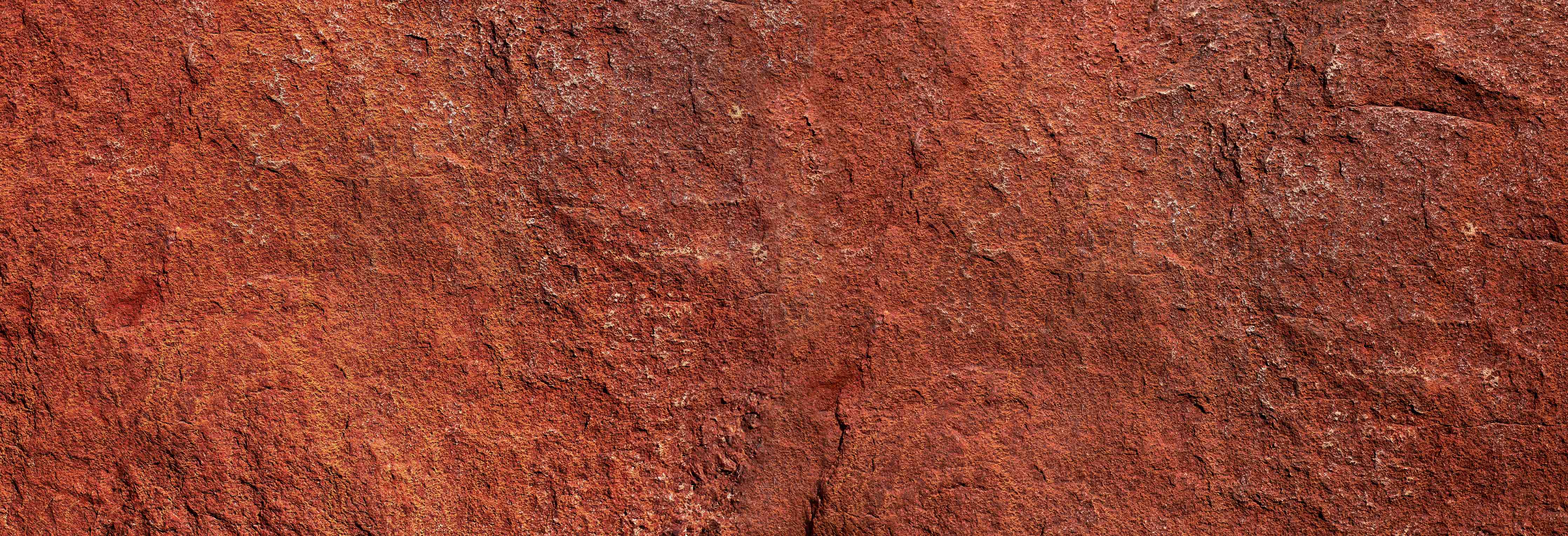 Wandverkleidung Bad-Rötliche Steinstruktur mit natürlicher Oberfläche