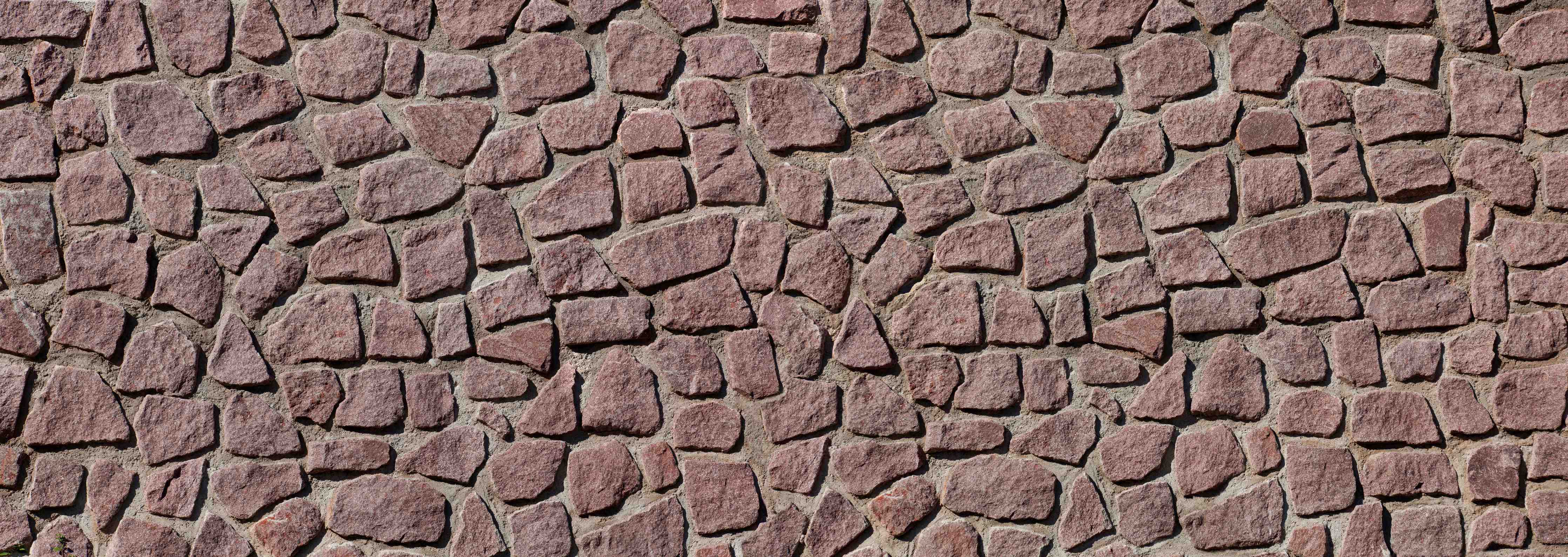 Wandverkleidung Bad-Rote Natursteinmauer