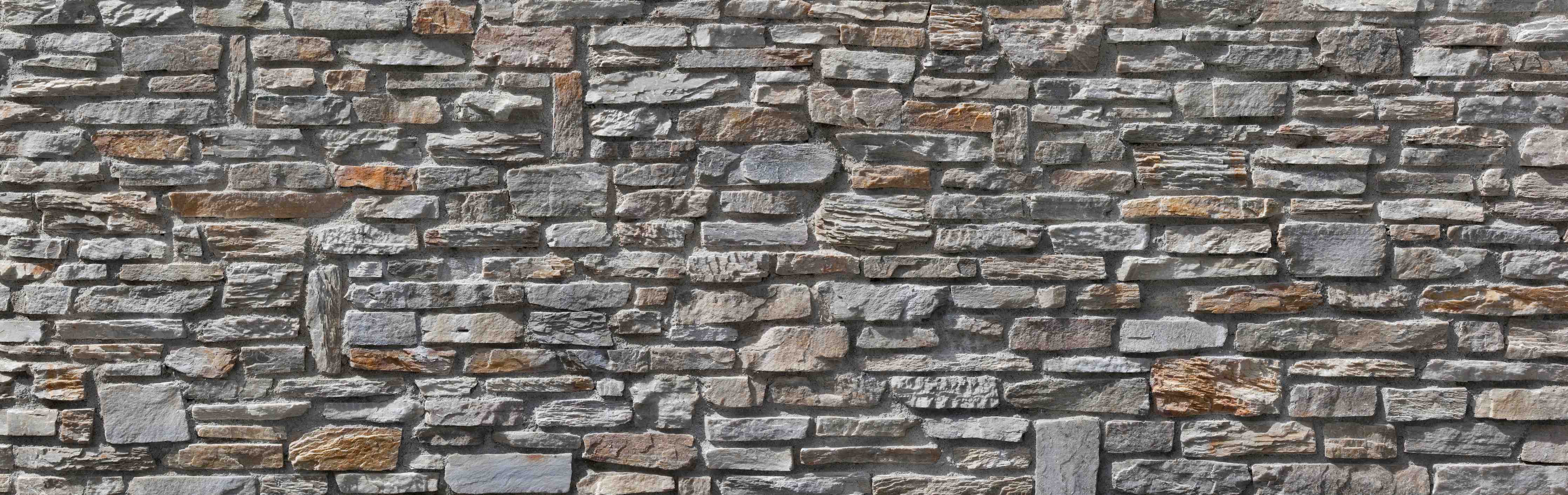 Wandverkleidung Bad-Rustikale Steinwand mit natürlichen Texturen