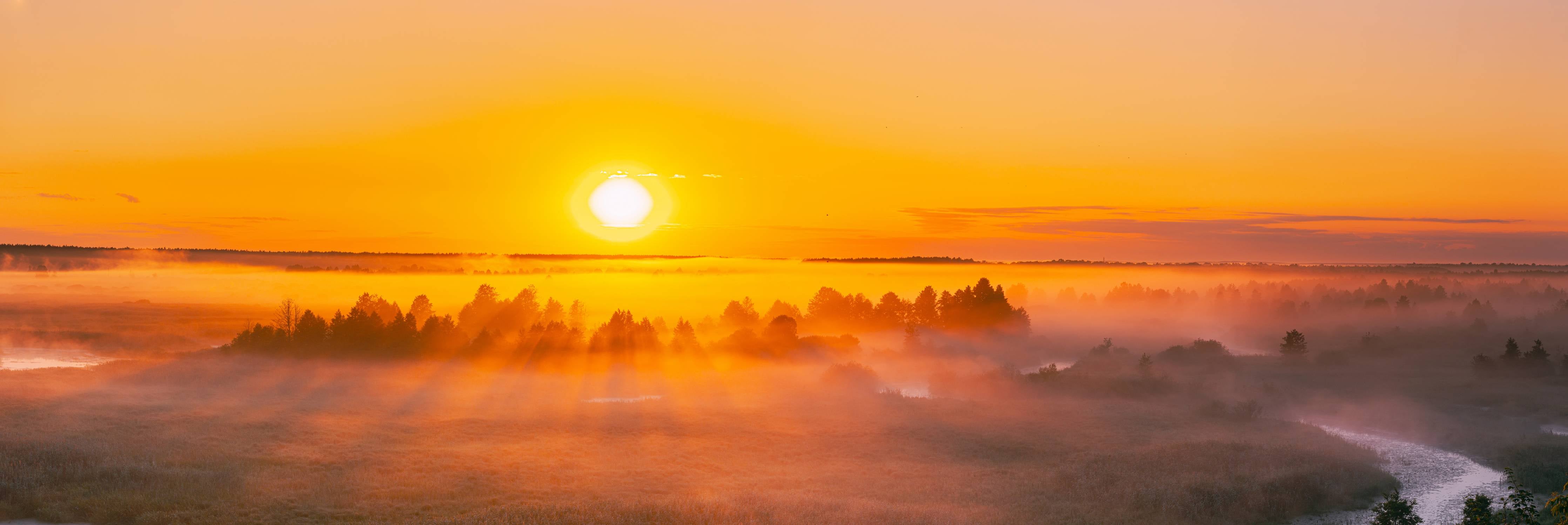 Wandverkleidung Bad-Sonnenaufgang über nebligem Feld