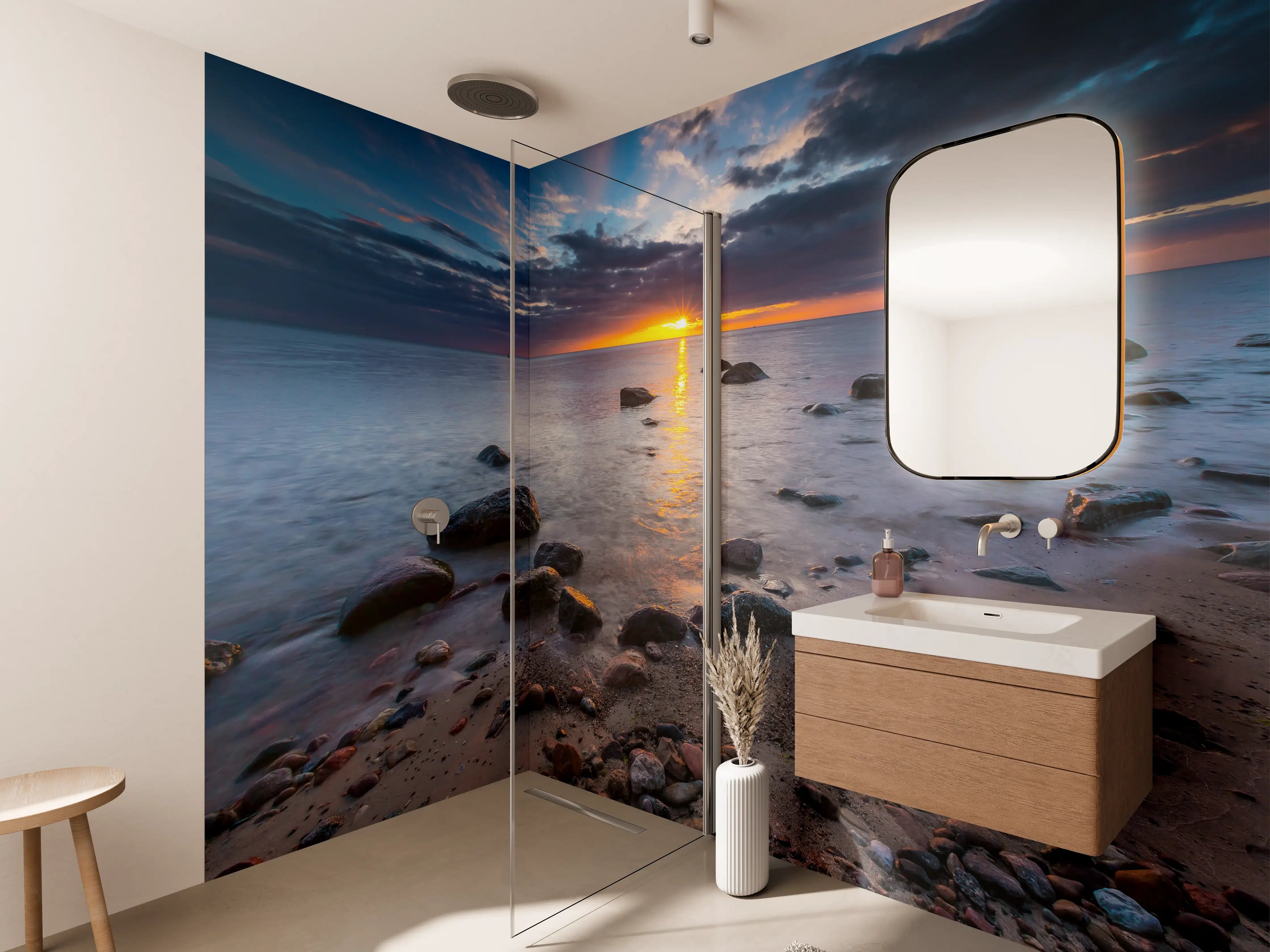 Wandverkleidung Bad - Sonnenuntergang am Strand mit Steinen und Wolken