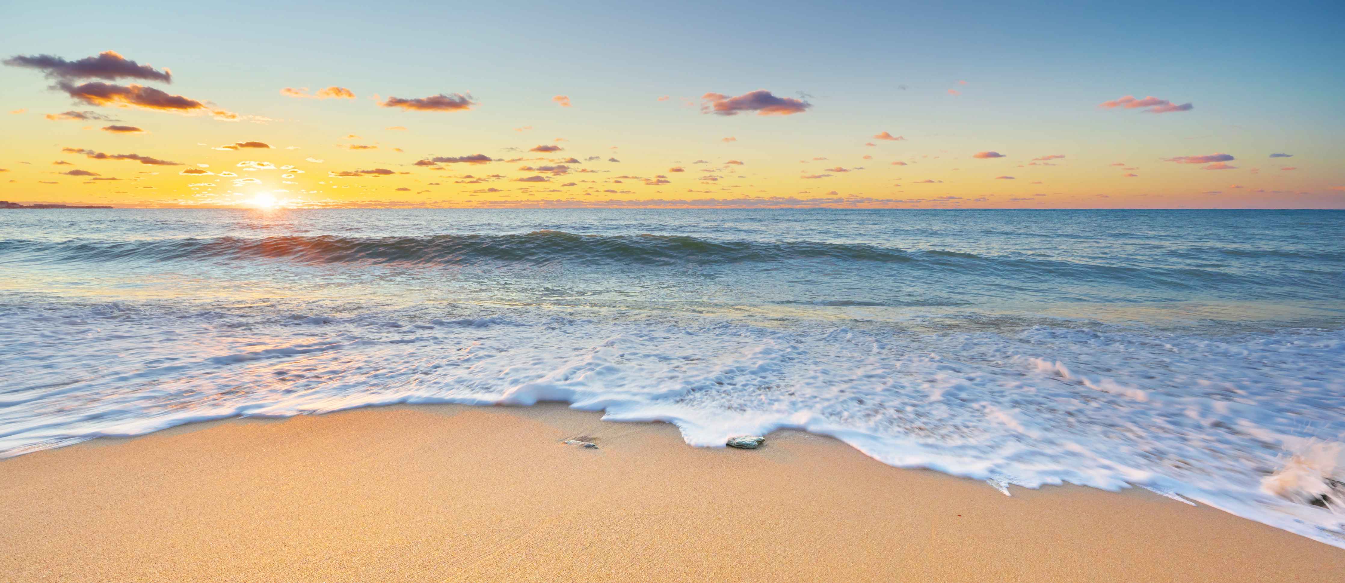 Wandverkleidung Bad-Sonnenuntergang am Strand mit warmen Farbtönen