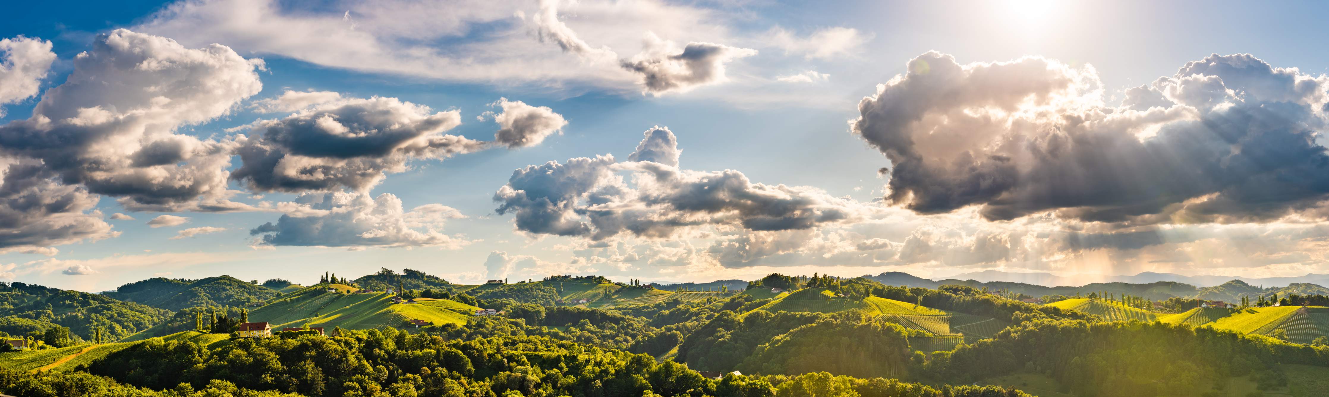Wandverkleidung Bad-Traumhafter Landschaftshimmel mit Wolken und Sonne