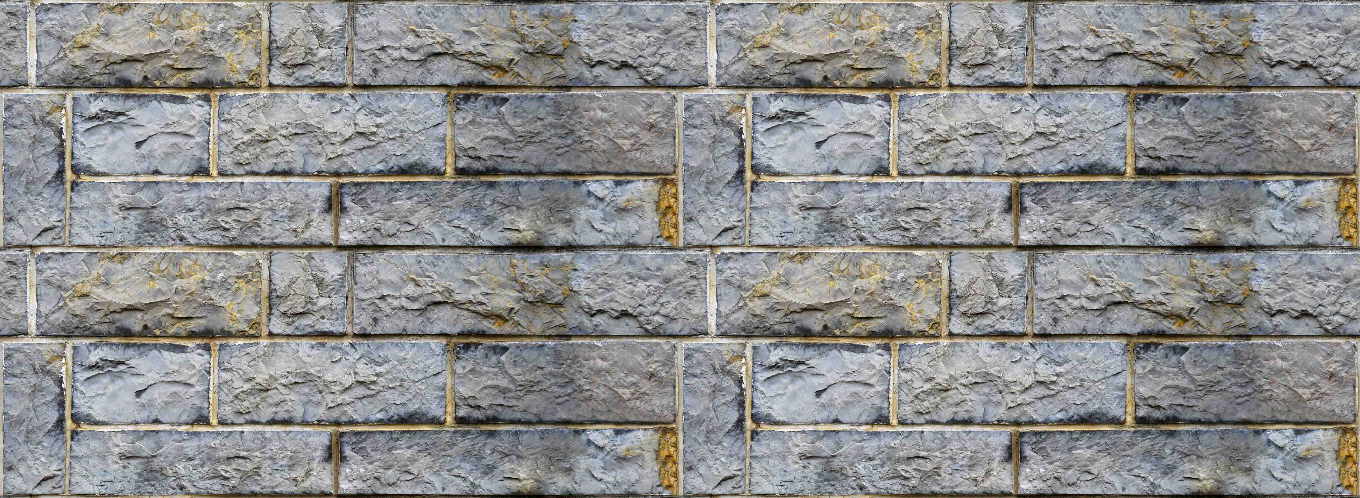 Wandverkleidung Flur-Graue Schnittsteinmauer