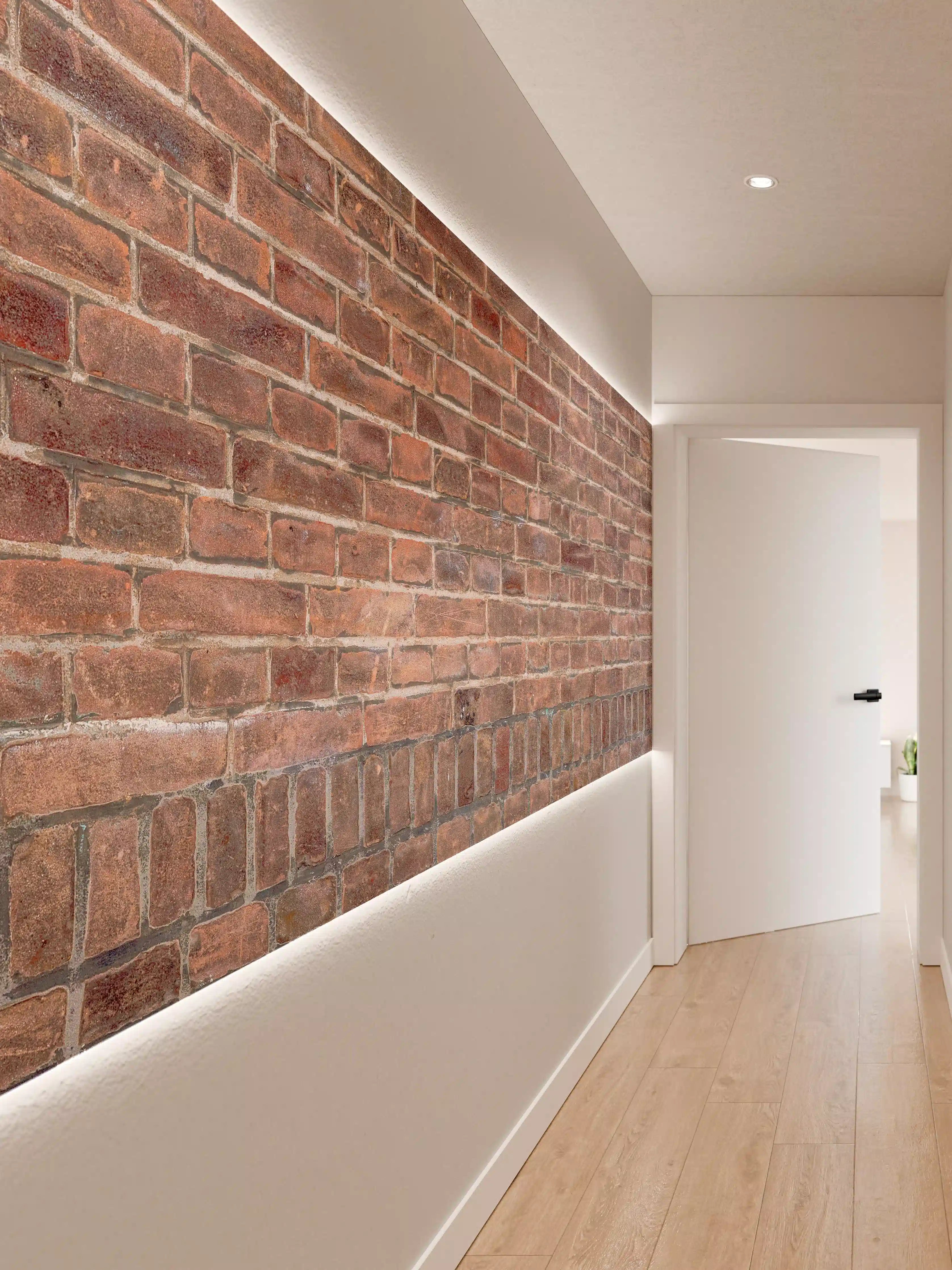 Wandverkleidung Flur - Mauerstruktur aus alten braunen Ziegeln
