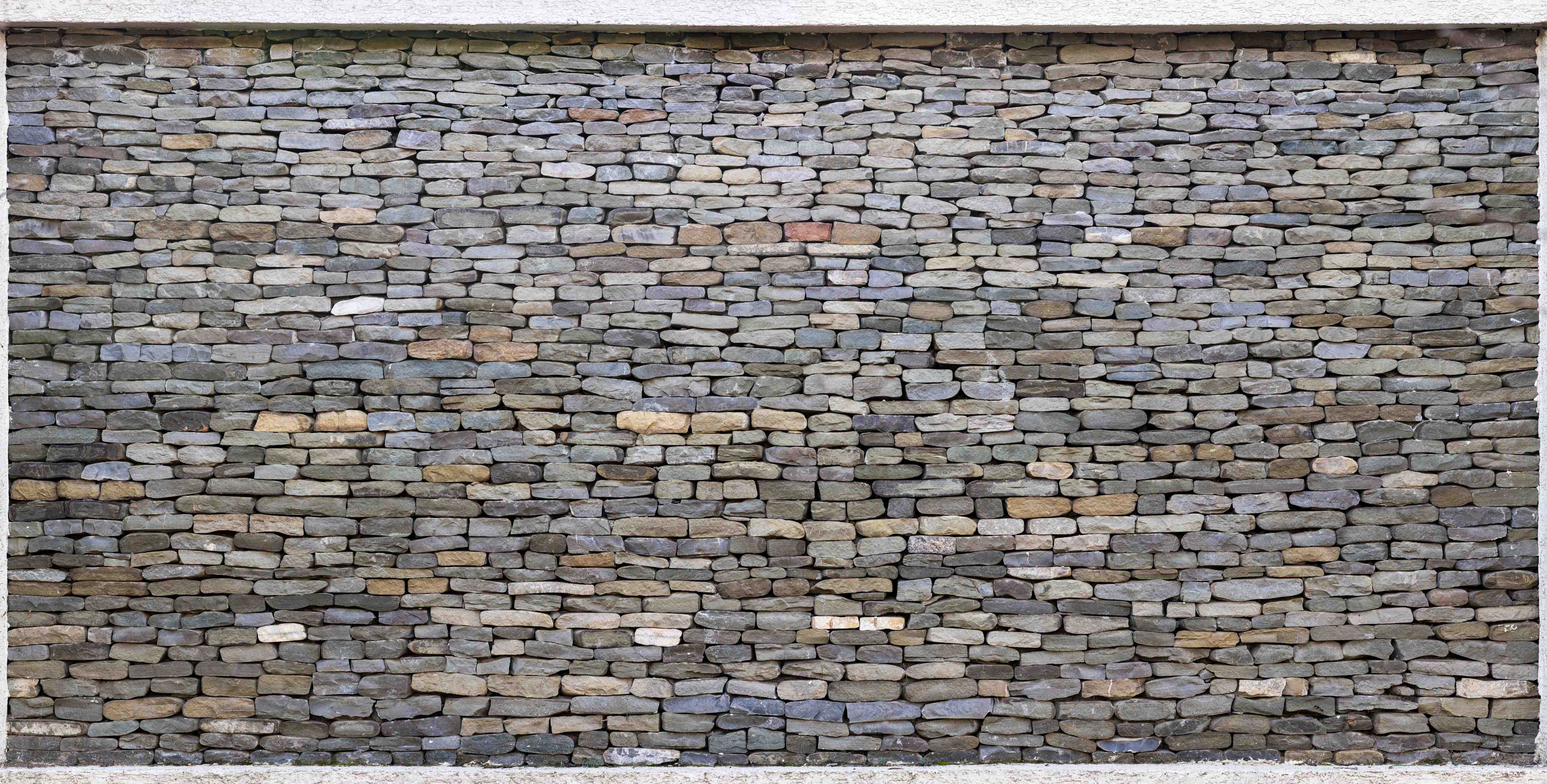 Wandverkleidung Flur-Pastellfarbene Steinmauer