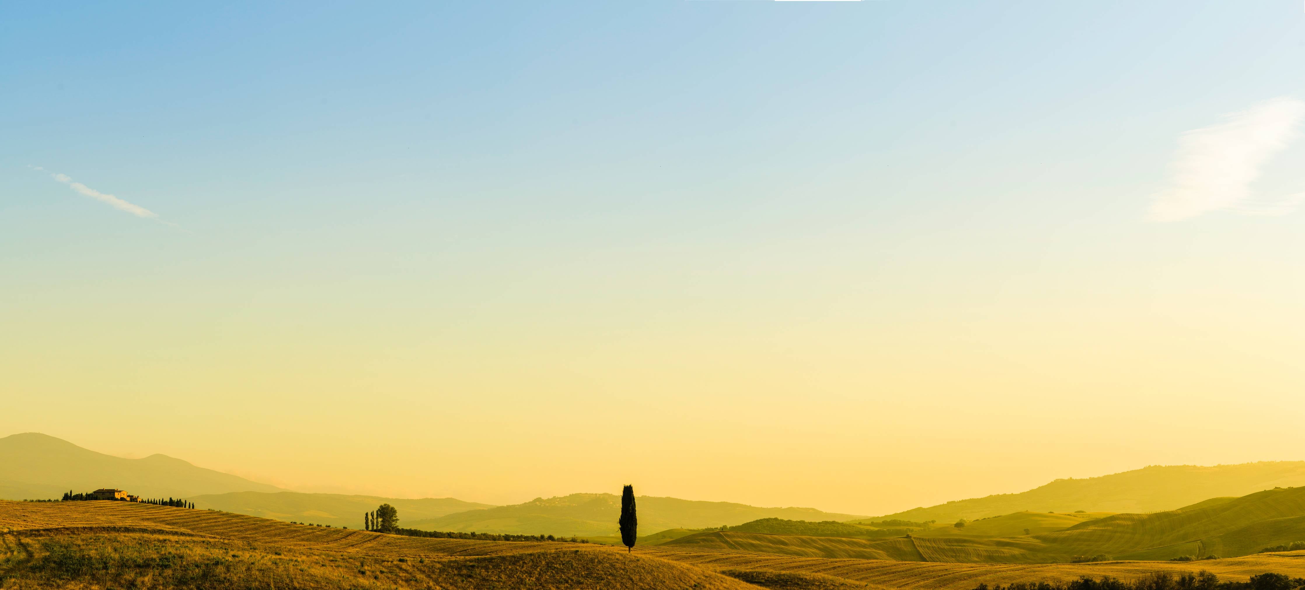 Wandverkleidung Flur-Toskanische Hügel im Abendlicht