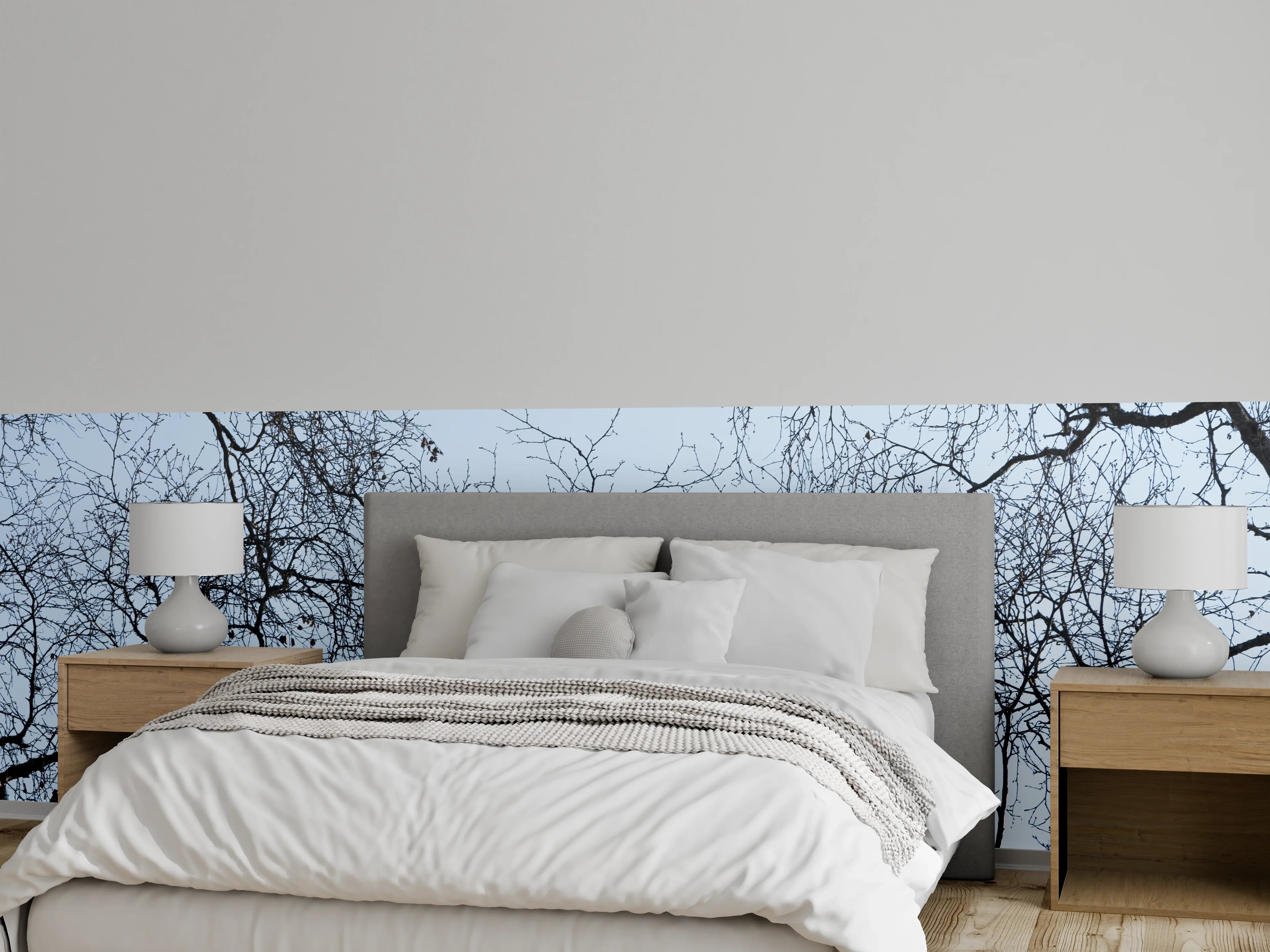 Wandverkleidung Schlafzimmer - Ästhetische Baum-Silhouetten vor blauem Himmel
